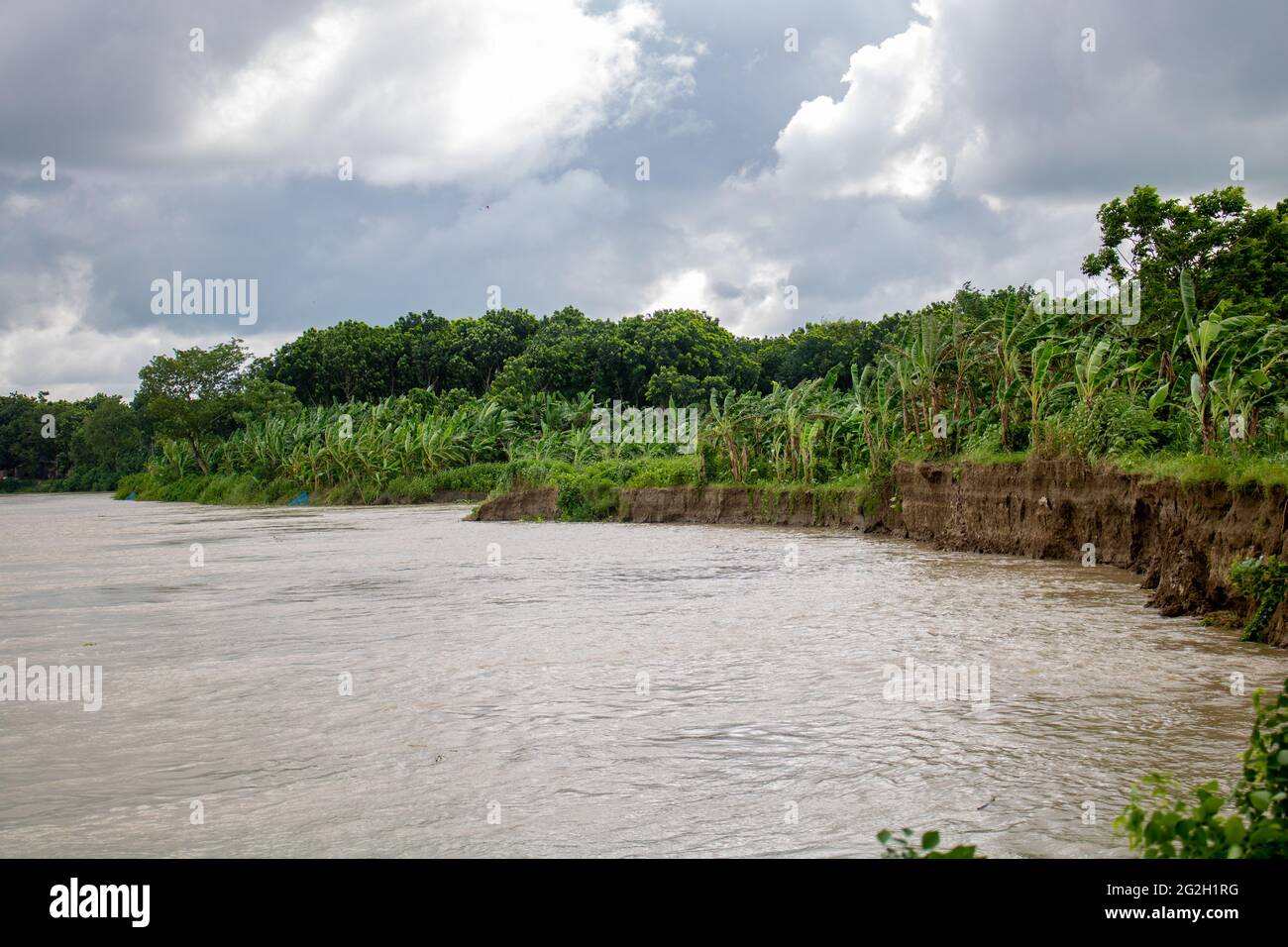 A beautiful landscape of Bangladesh. Great picture of a river. A scene of river breaking. During the monsoon season, the water level in the river rise Stock Photo