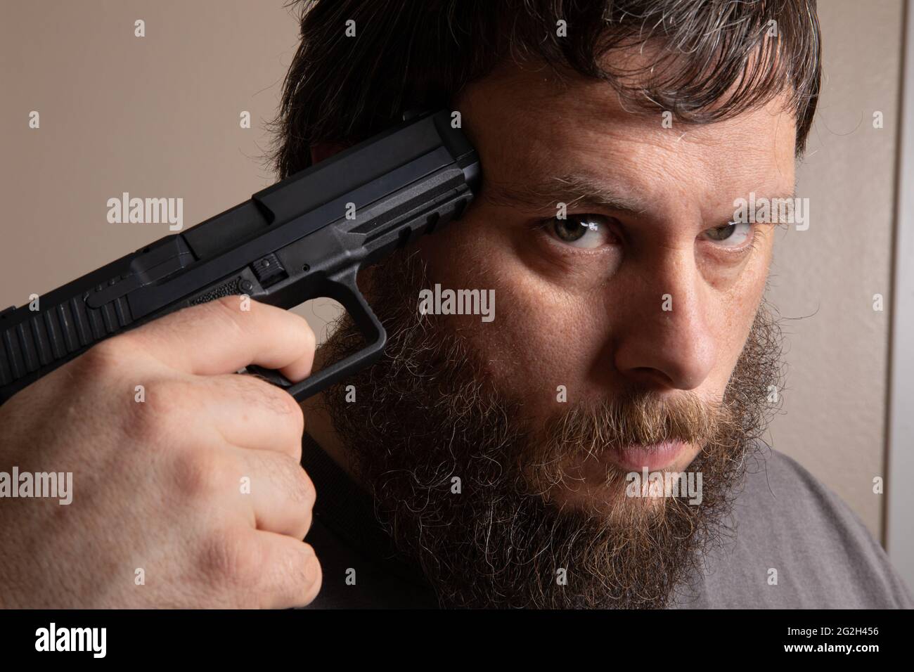 Aiming gun at head hires stock photography and images Alamy
