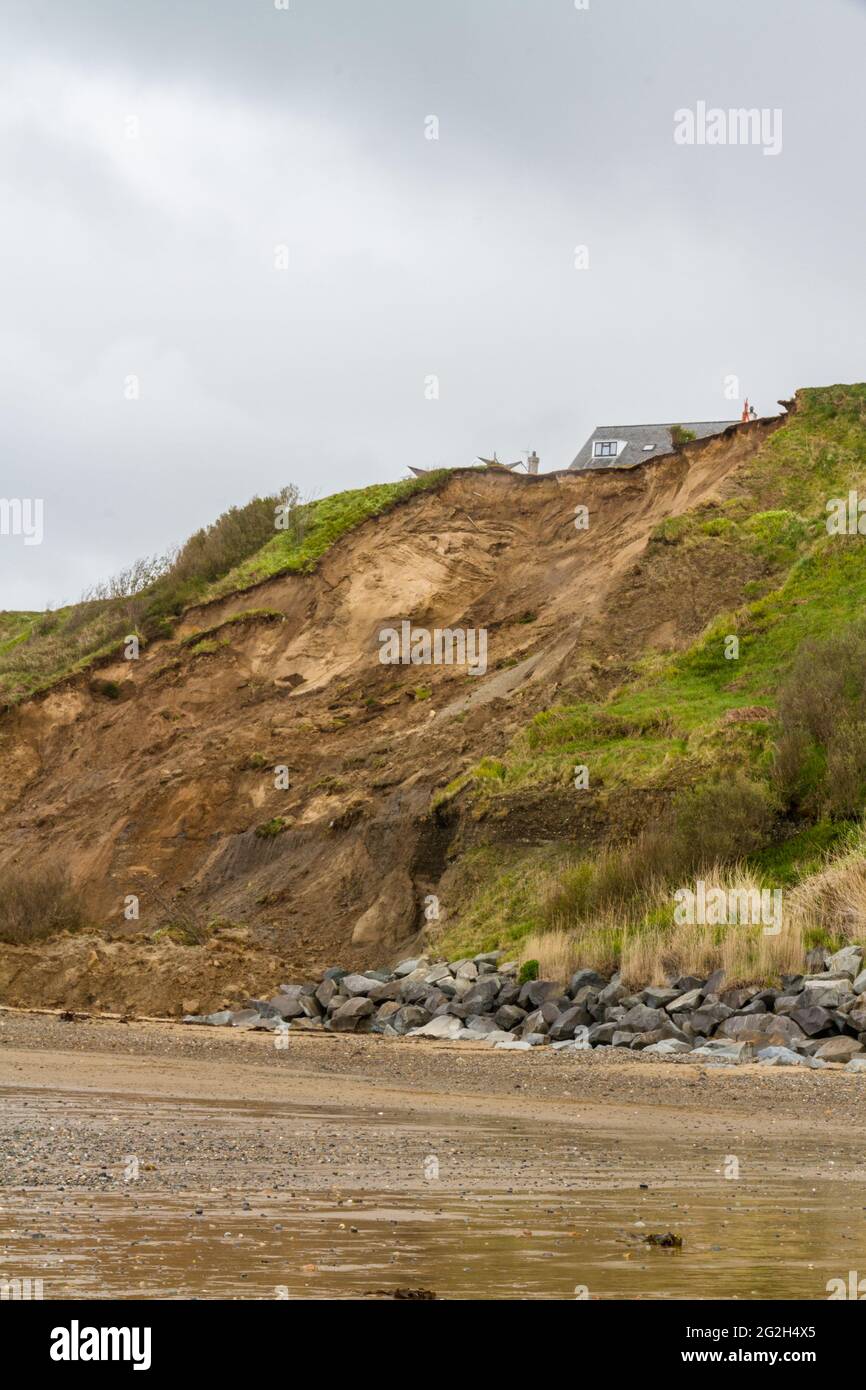 View from beach of the cliffs above the landslip at Nefyn, Llyn Peninsula, Wales, UK. This happened in April 2021, this image taken in May 2021, portr Stock Photo