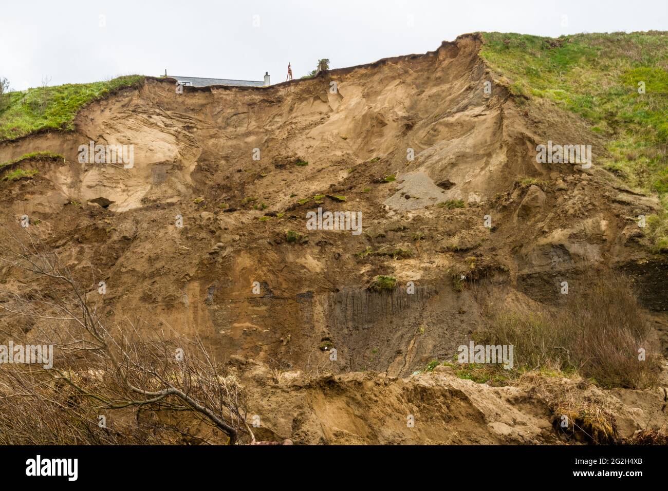 View from beach of the cliffs above the landslip at Nefyn, Llyn Peninsula, Wales, UK. This happened in April 2021, this image taken in May 2021, lands Stock Photo
