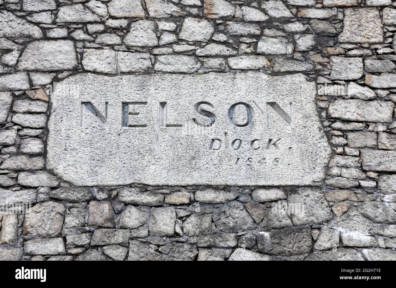 Nelson Dock sign in the boundary wall at Liverpool Stock Photo
