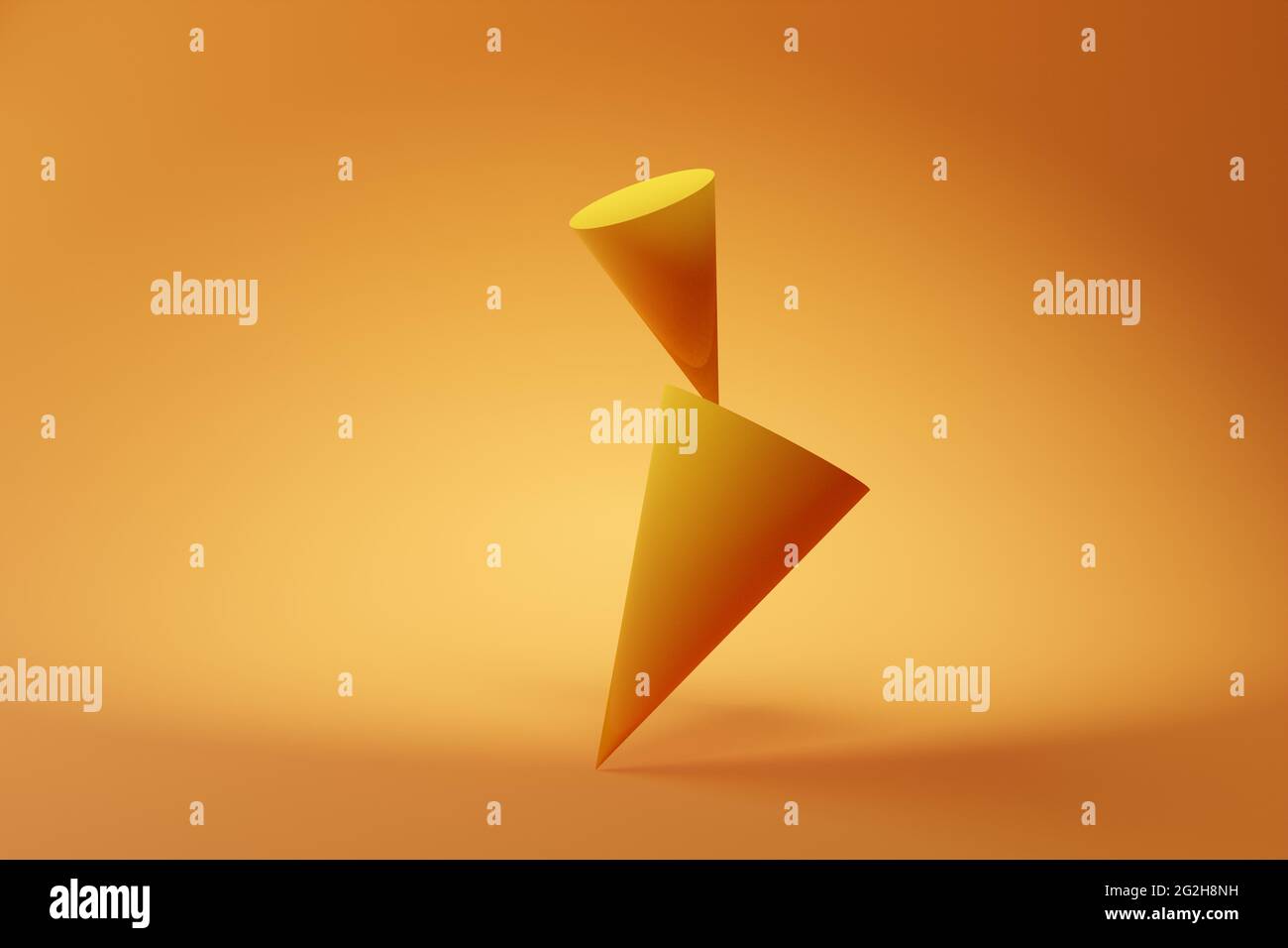 Geometrical primitive cones balancing over orange background, modern ...