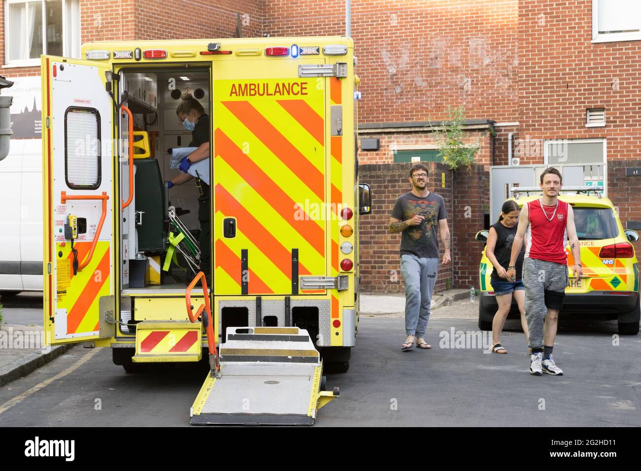 Medical staff attended casualty , got into rear door of London Ambulance, London, England UK Stock Photo