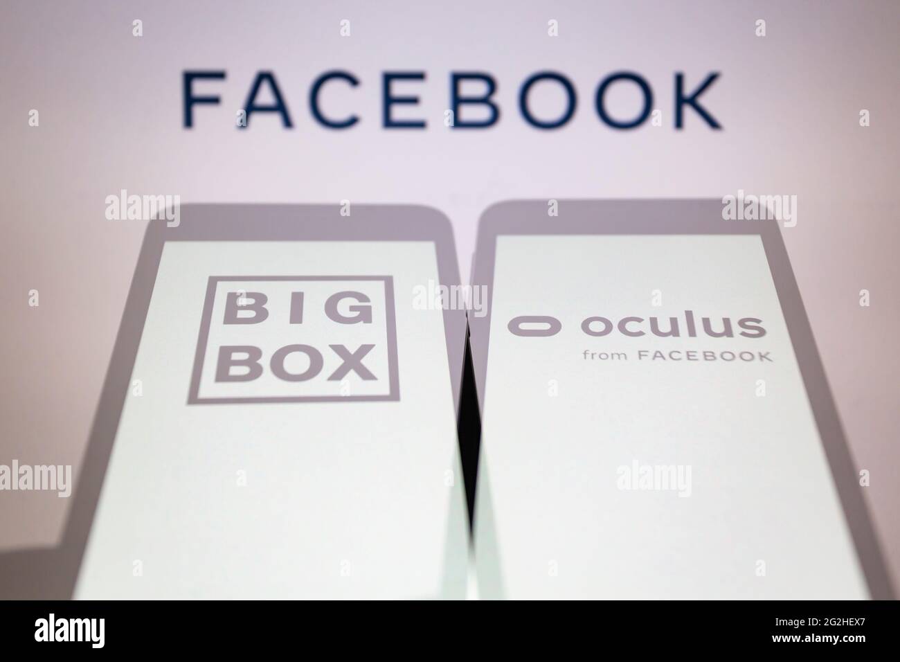 Asuncion Paraguay 11th June 21 Illustration Photo In Camera Multiple Exposure Image Shows Logos Of Bigbox Vr And Oculus On Smartphone Backdropped By The Logo Of Facebook Company On Screen Facebook Has