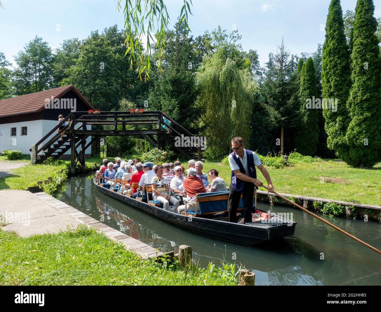 Boat with tourists in Leipe, Innerer Spreewald near Lübbenau, Biosphere Reserve, Brandenburg, Germany Stock Photo