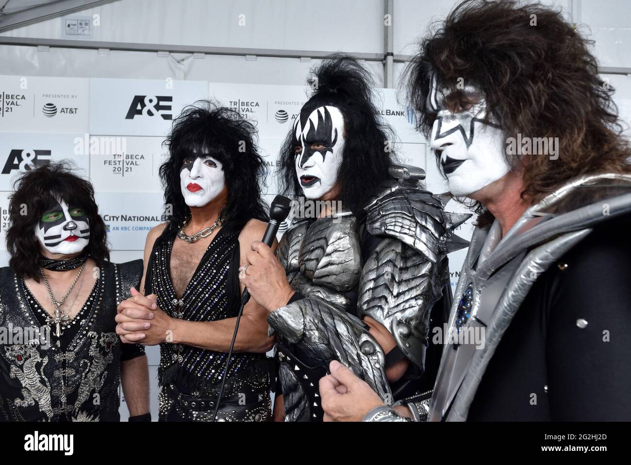 Paul Stanley poses with Hello Kitty at the KISS by Monster Mini