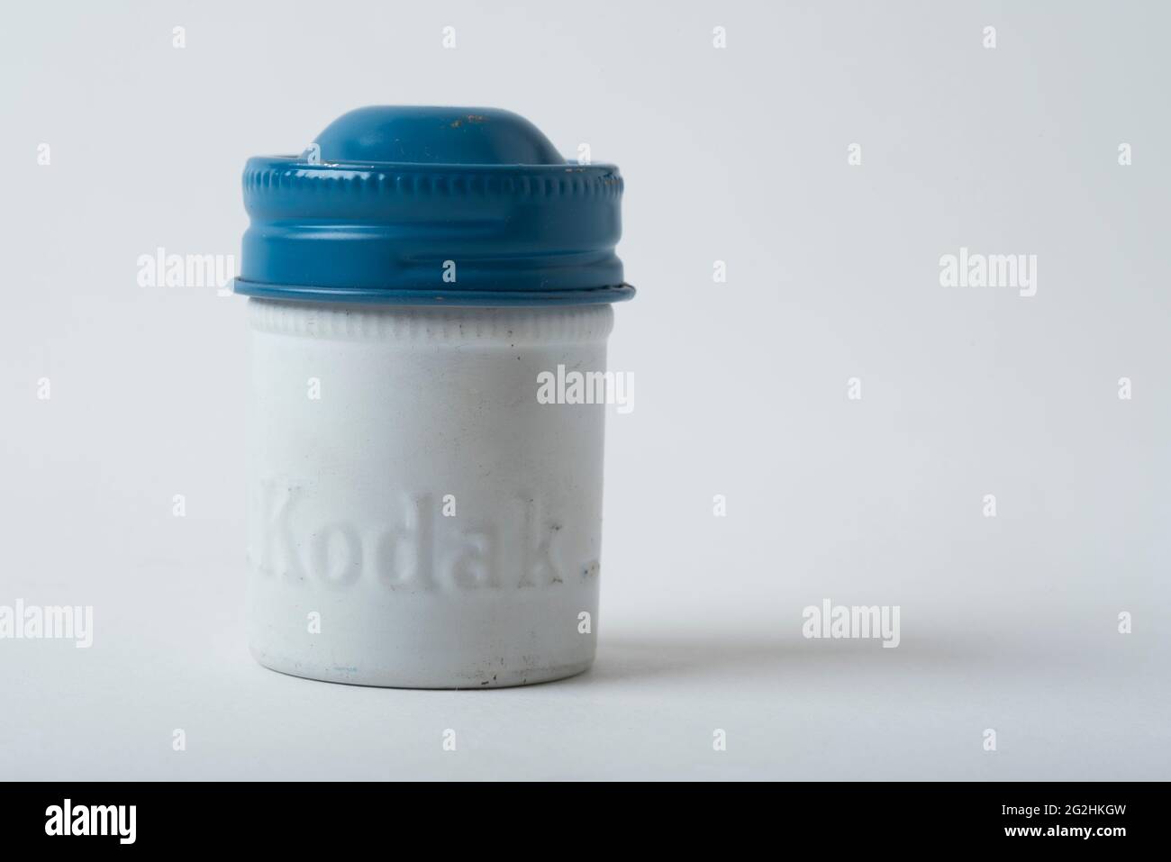 Kodak Tri-X pan film in 35mm format from the 1950s and container. Stock Photo