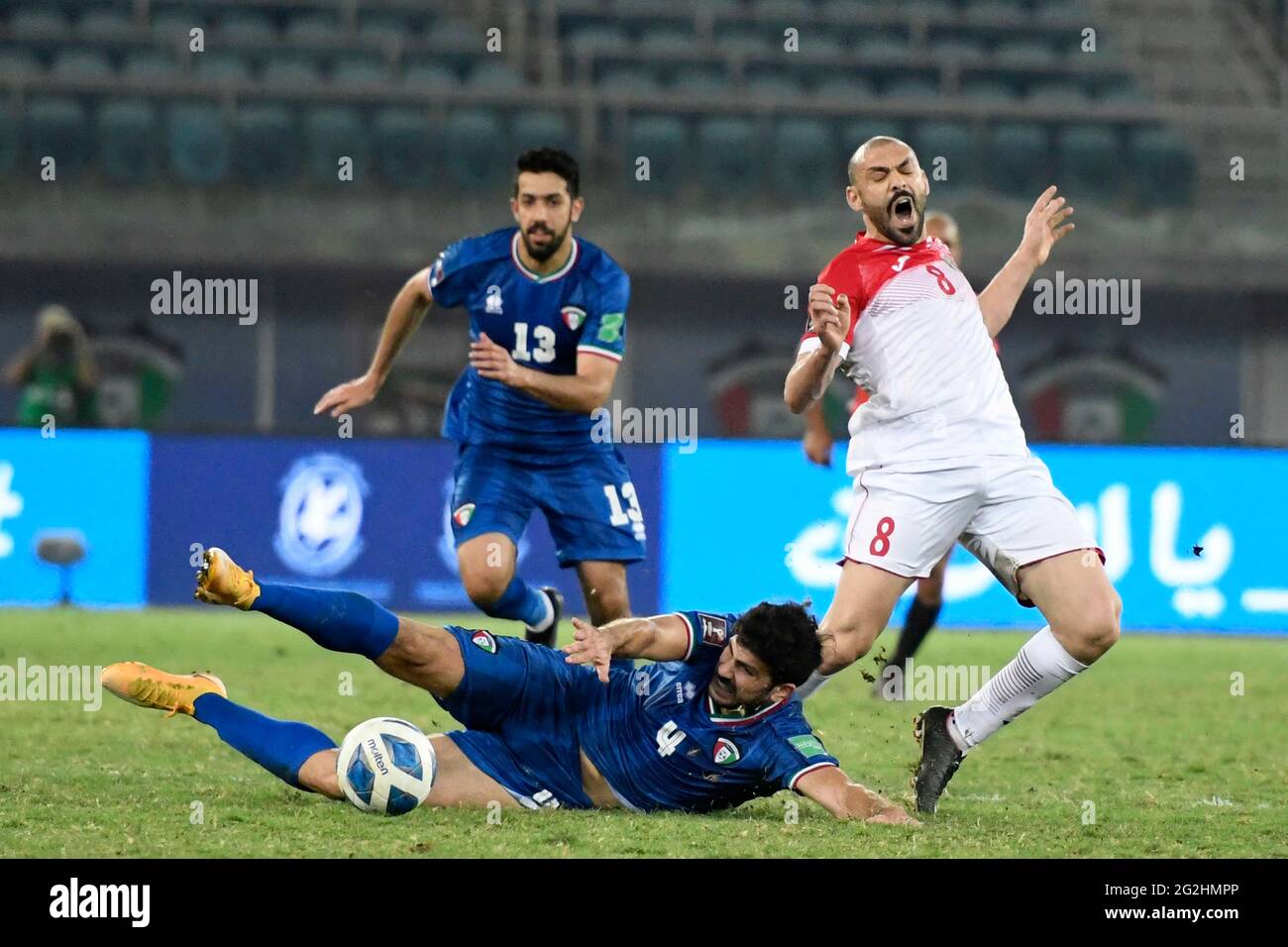 Kuwait City, Kuwait. 11th June, 2021. Odai Yousef Alsaify (R) of Jordan