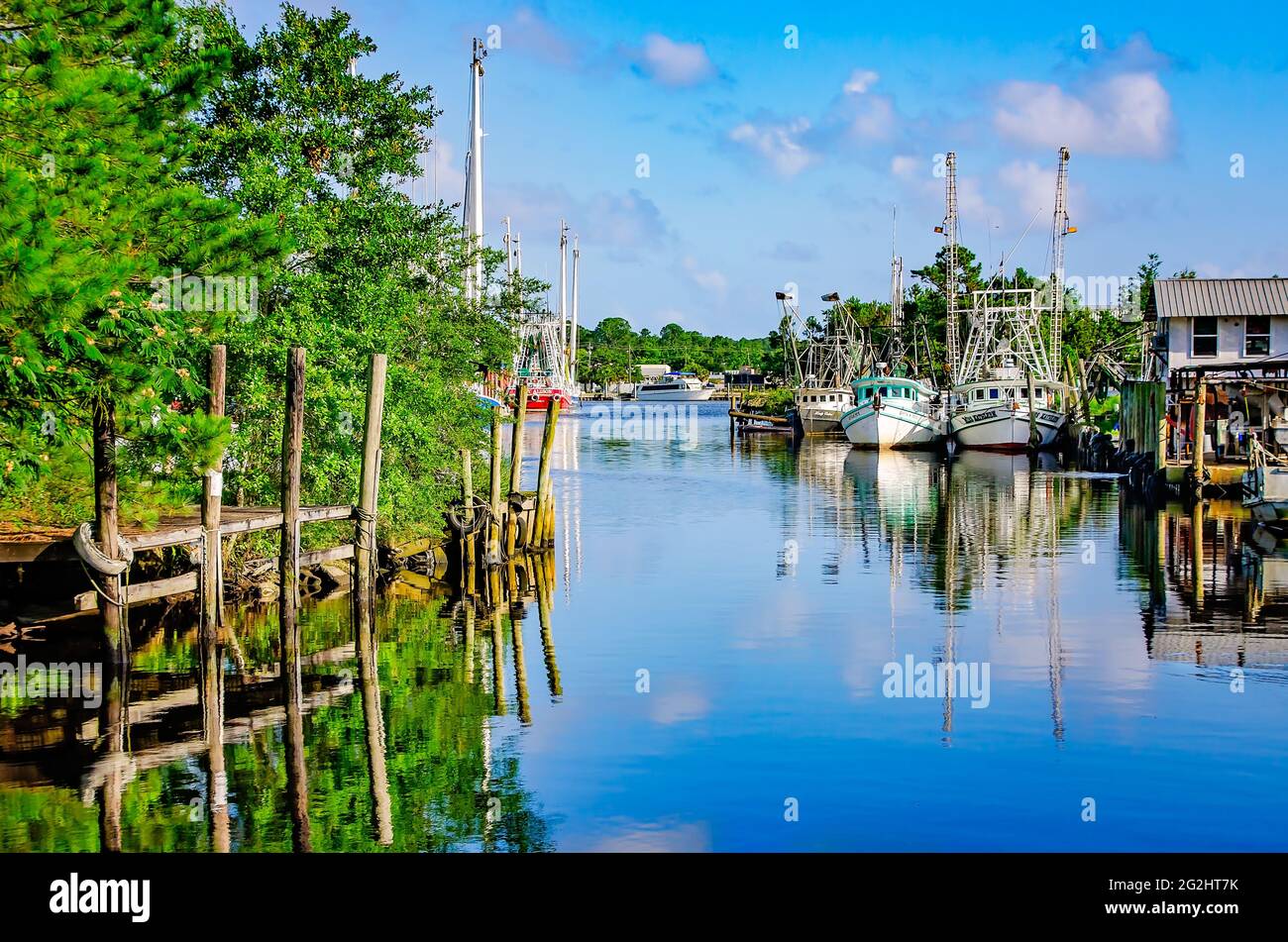 Shrimp boats are docked in the bayou, June 9, 2021, in Bayou La Batre