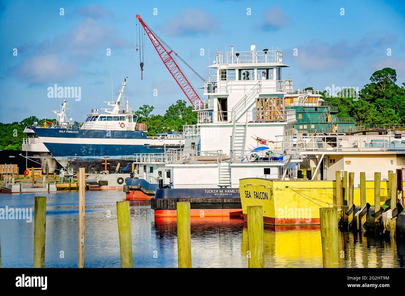 Gulf Princess, an offshore supply vessel, awaits repairs with other boats at a local shipyard, June 9, 2021, in Bayou La Batre, Alabama. Stock Photo