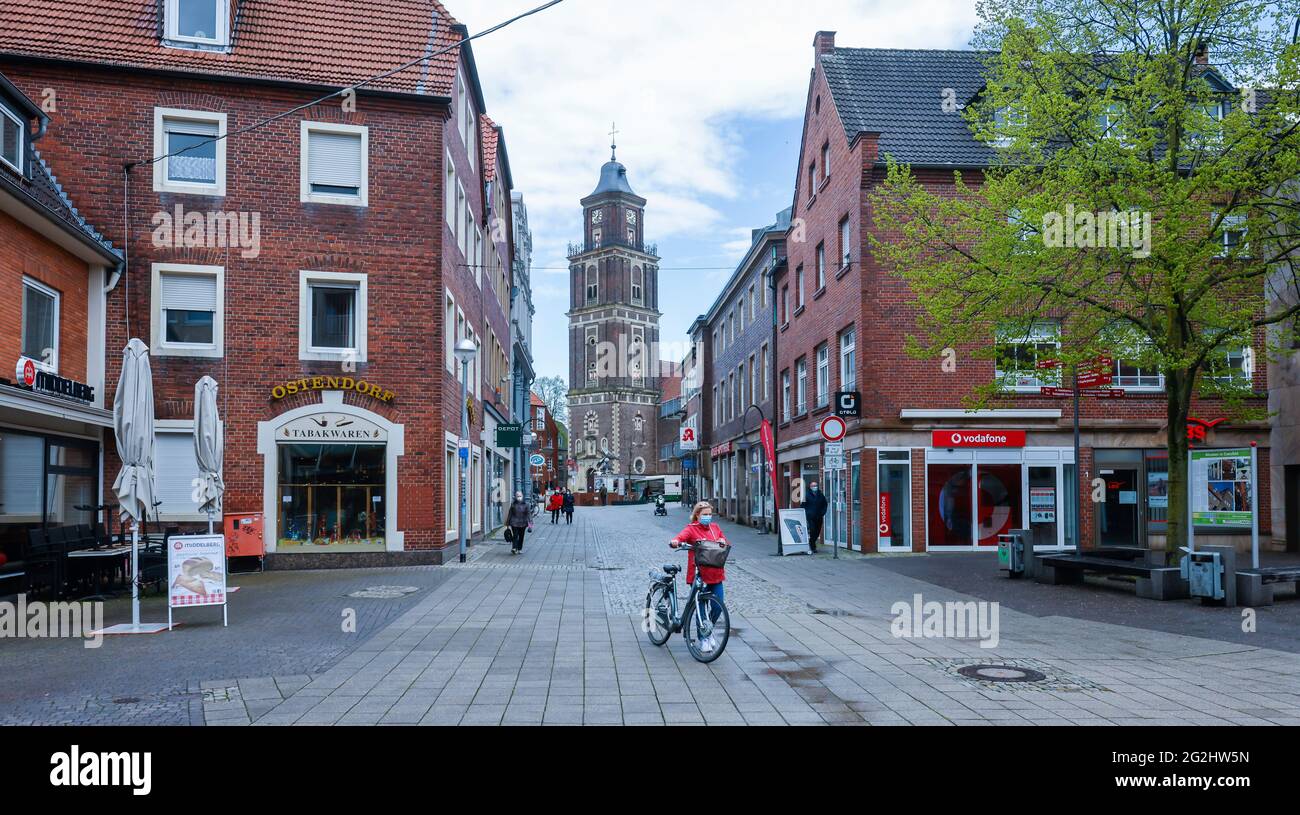 Coesfeld, North Rhine-Westphalia, Germany - pedestrian zone in times of the corona pandemic, the Coesfeld district starts as a model region in North Rhine-Westphalia with easing, shopping is possible again without prior appointment, in the back church St. Lamberti. Stock Photo