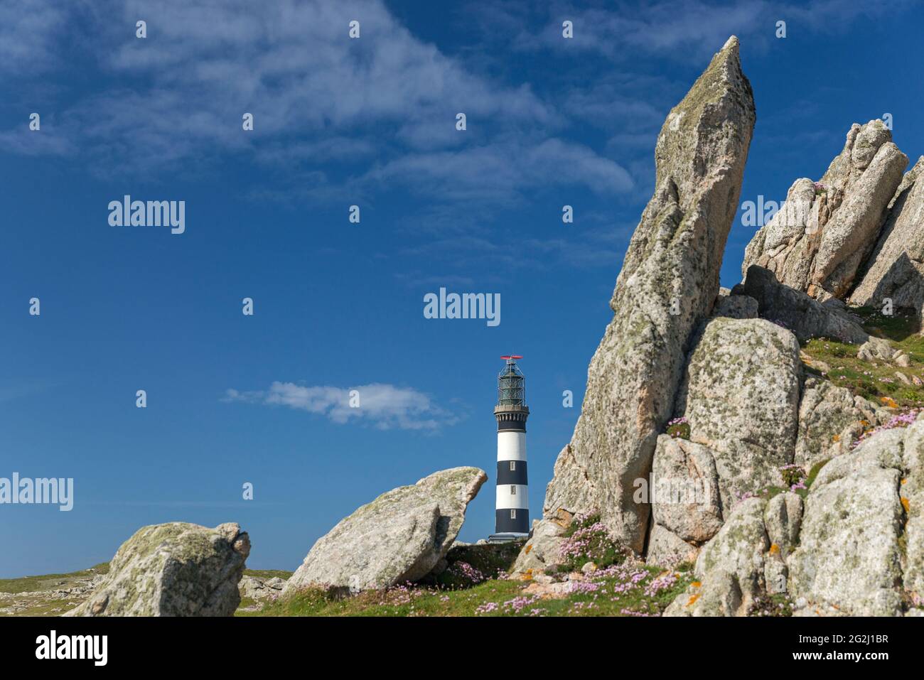 Lighthouse Créac'h between rocks, Île d'Ouessant, France, Brittany, Finistère department Stock Photo