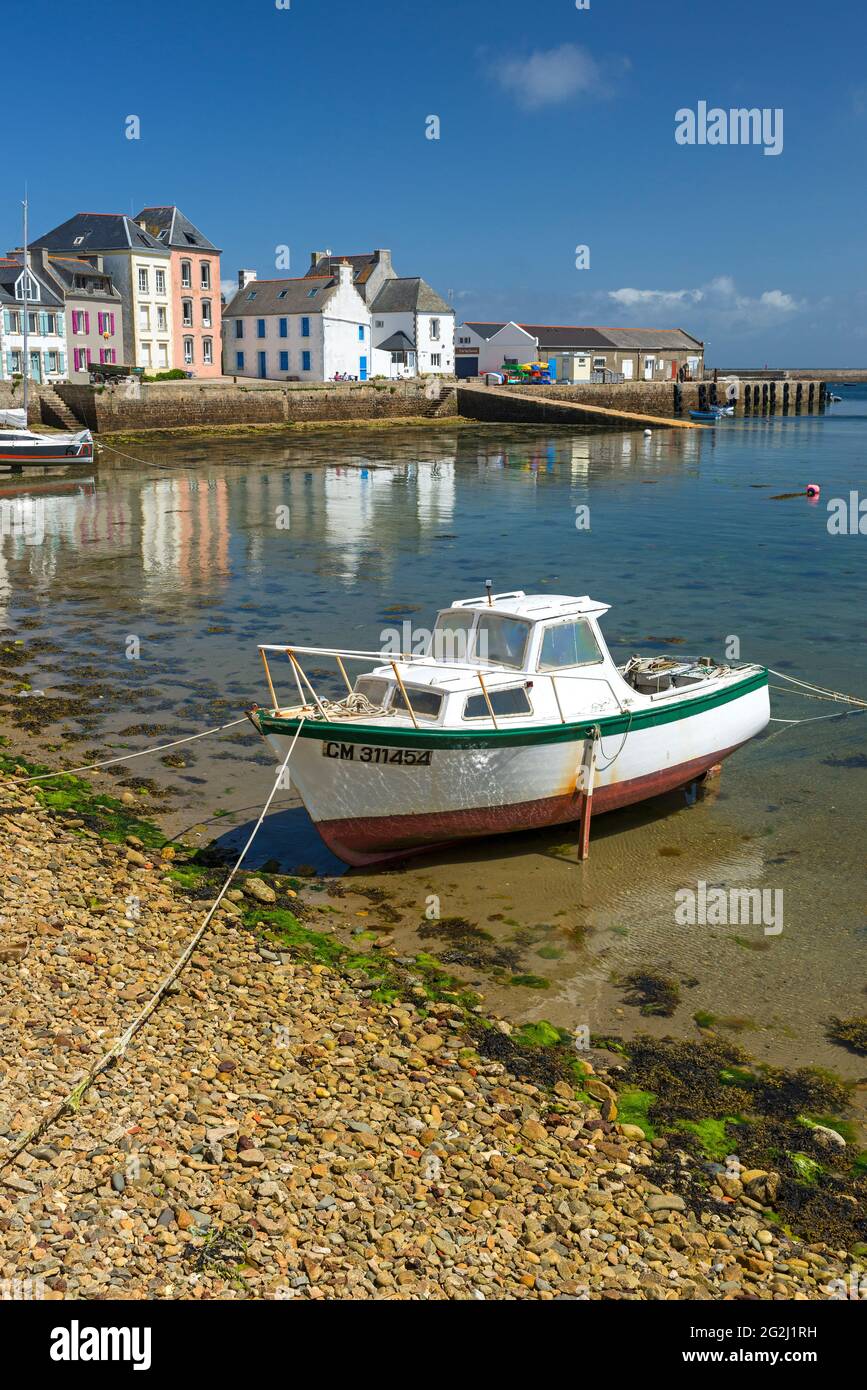Île de Sein, colorful houses and boats in the harbor, France, Brittany, Finistère department Stock Photo