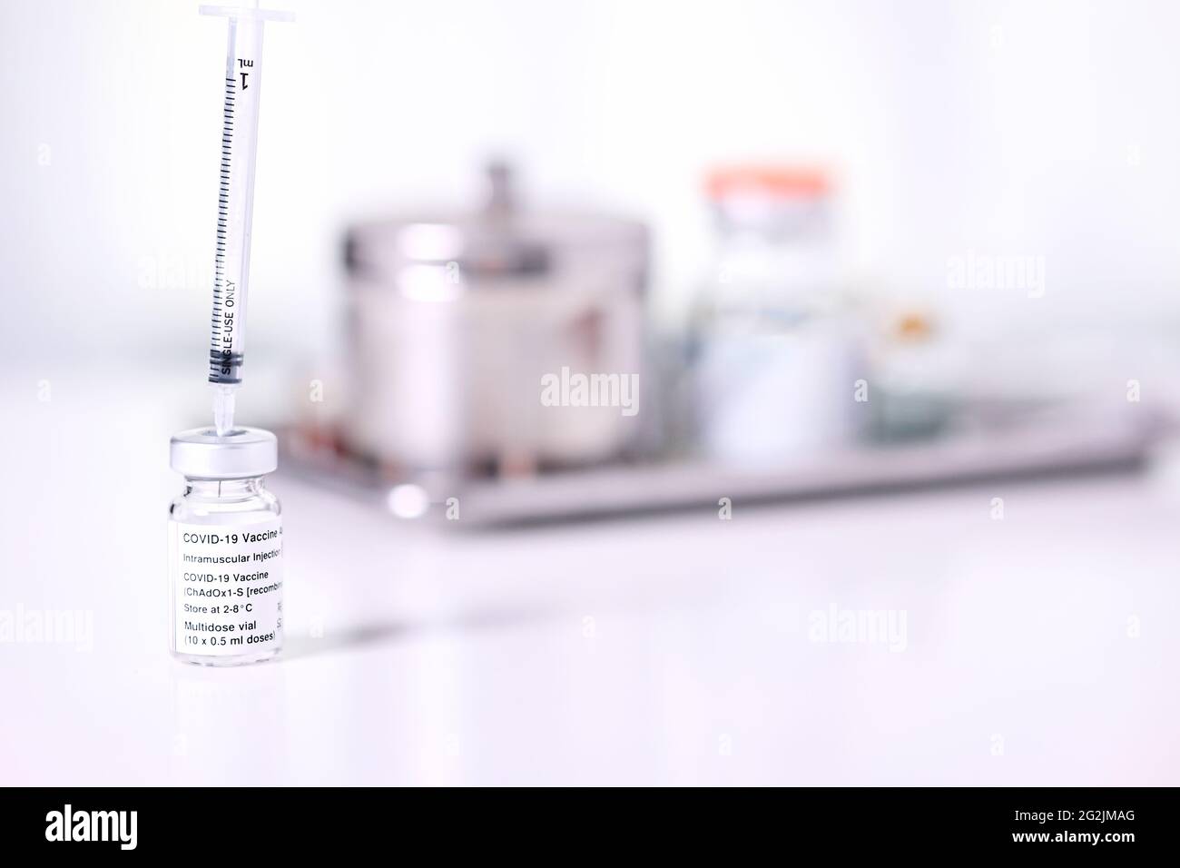 Vial Of Covid-19 Vaccine ,COVID-19 vaccines can help reduce the transmission of the new coronavirus from person to person Stock Photo