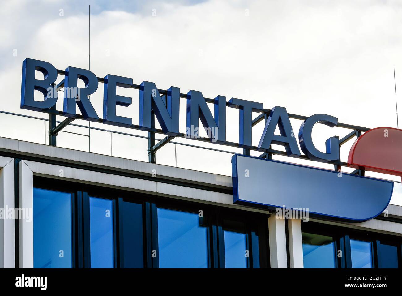 Essen, North Rhine-Westphalia, Germany - Brenntag, company logo on the facade of the Brenntag headquarters, Brenntag SE is the holding company for the Brenntag Group, the world market leader in the distribution of chemicals and ingredients. Stock Photo