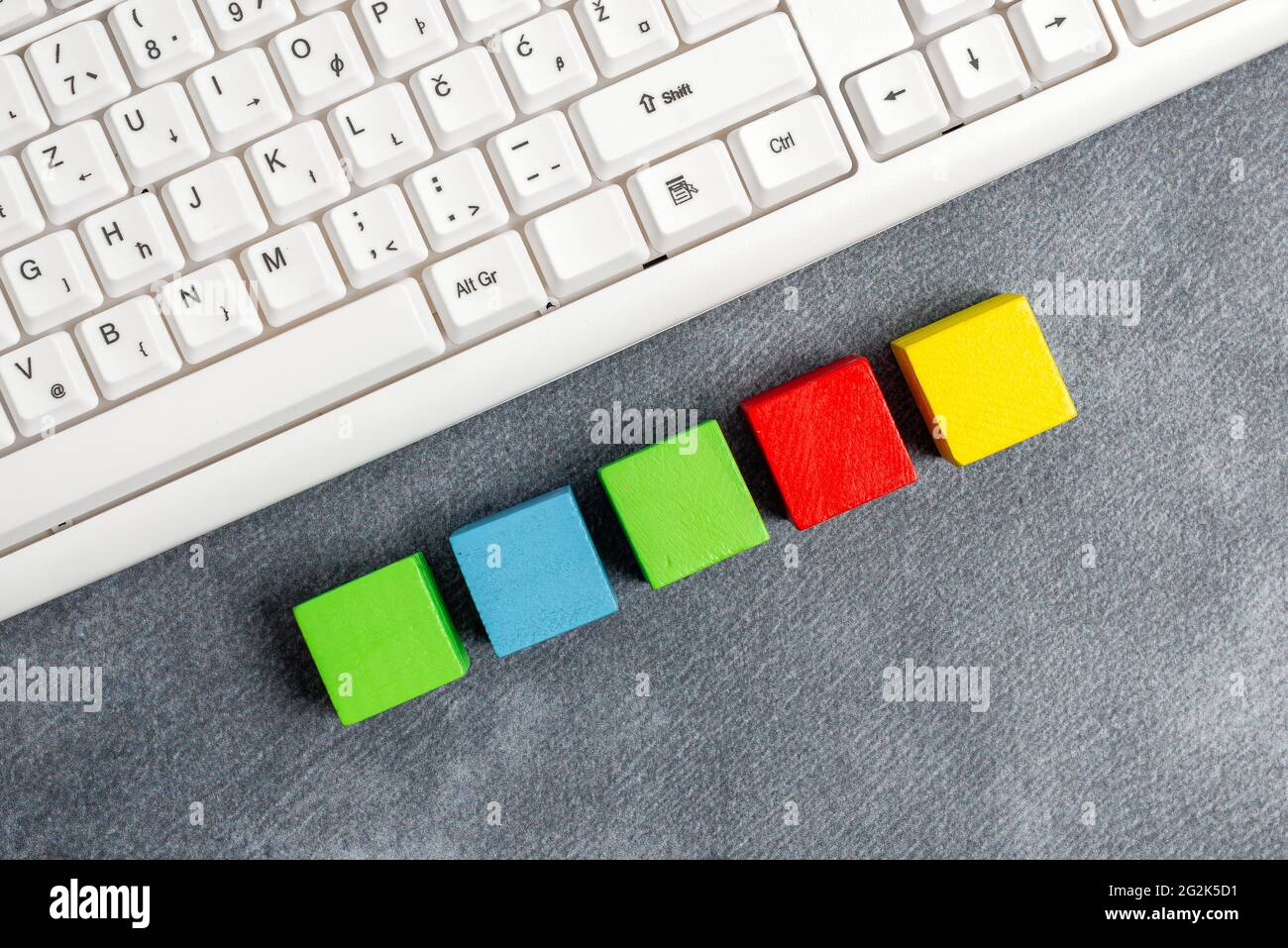 Stack of Sample Cube Rectangular Boxes On Surface Polished With Multi-Colour Stock Photo