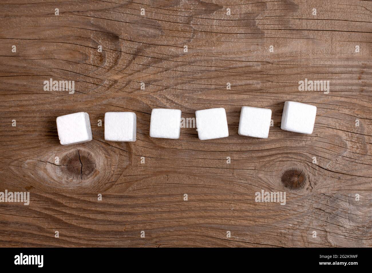 Stack of Sample Cube Rectangular Boxes On Surface Polished With Multi-Colour Stock Photo