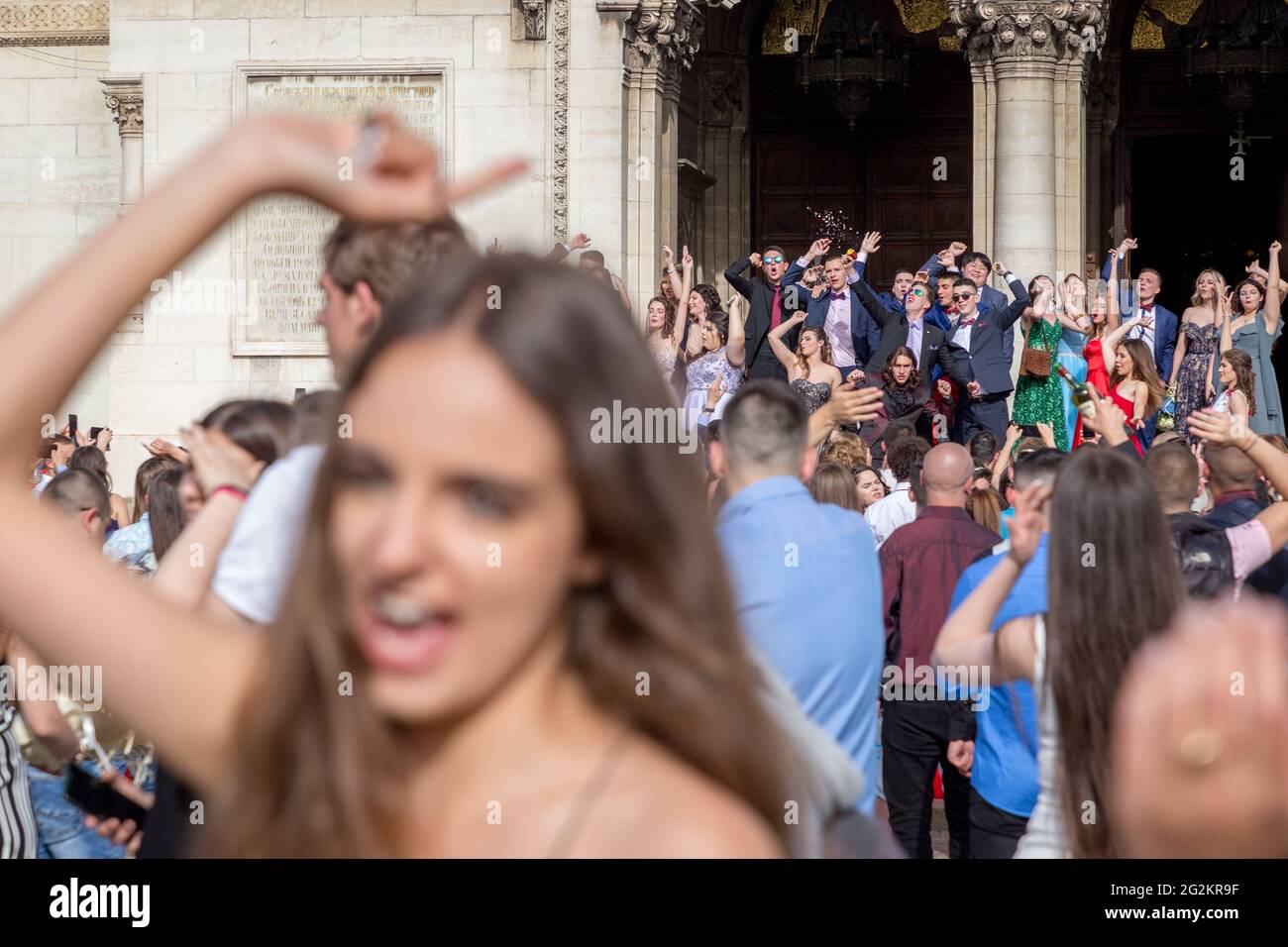 SOFIA, BULGARIA - MAY 24, 2021: High school graduates celebrate their graduation in Sofia downtown. Stock Photo