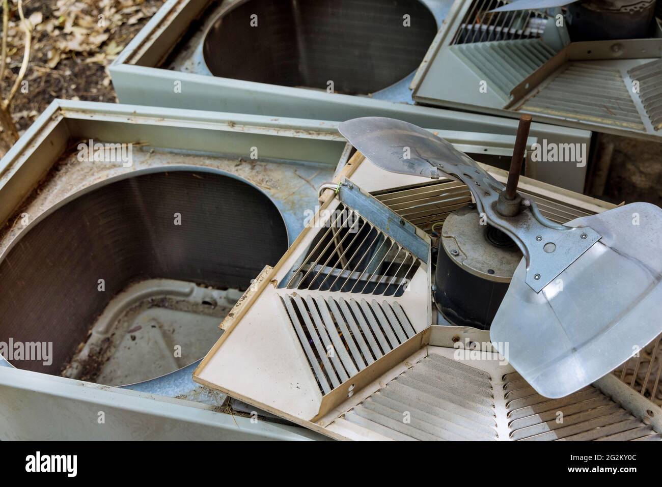 Air Conditioning system with technician cleaning air conditioner