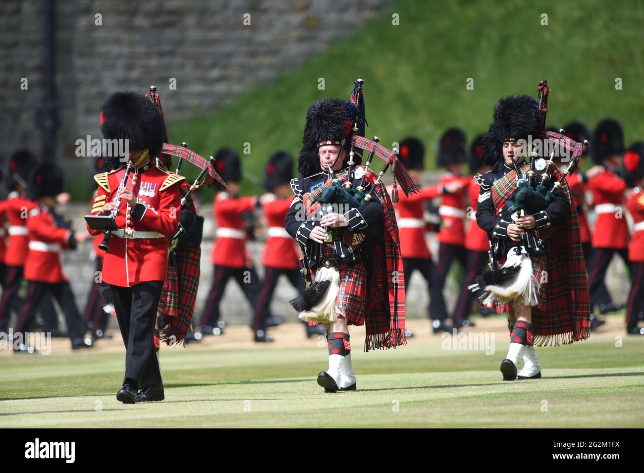 Members of the Massed Band of the Household Division during a ceremony at Windsor Castle in Berkshire to mark her official birthday. Picture date: Saturday June 12, 2021. Stock Photo