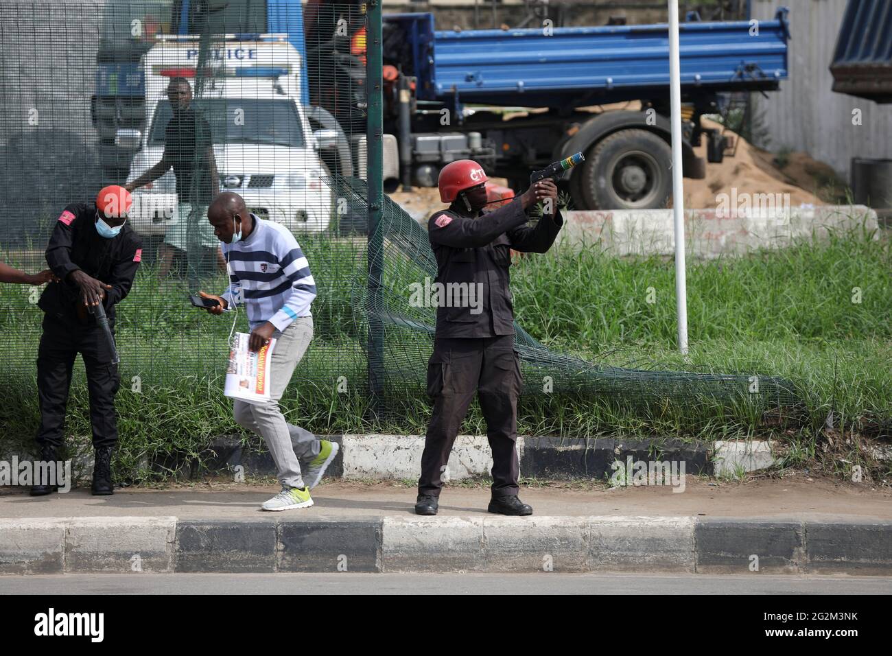 A Police Officer Prepares To Fire Tear Gas As They Try To Disperse Protesters During A June 12 Democracy Day Protest At The Gani Fawehinmi Park In Ojota Lagos Nigeria June 12