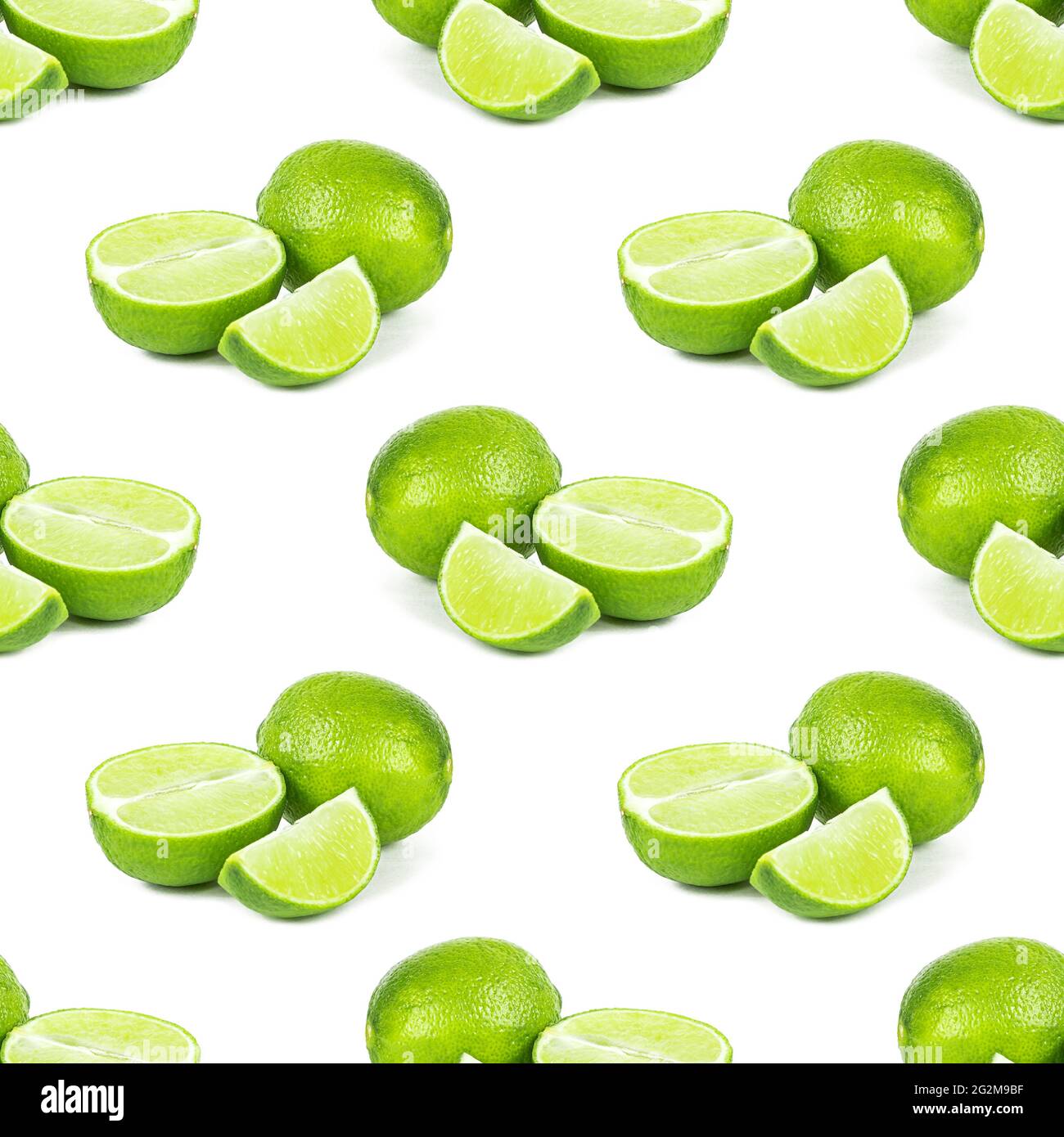 Green limes and lime slices repeat seamless pattern on white background. Stock Photo