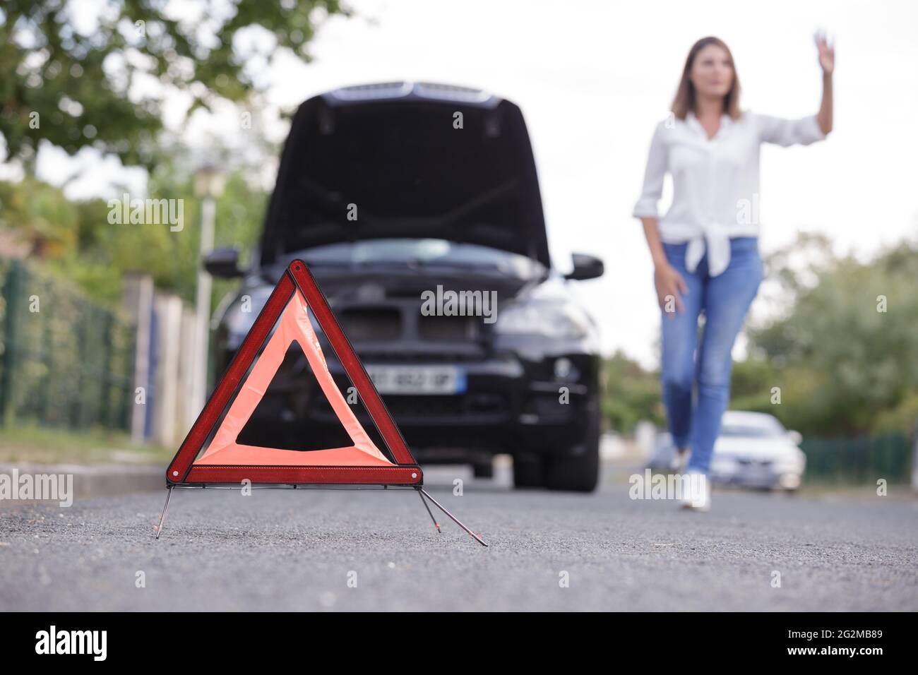 A Broken Car A Triangle Sign Stock Photo Alamy a-broken-car-a-triangle-sign-stock-photo-alamy