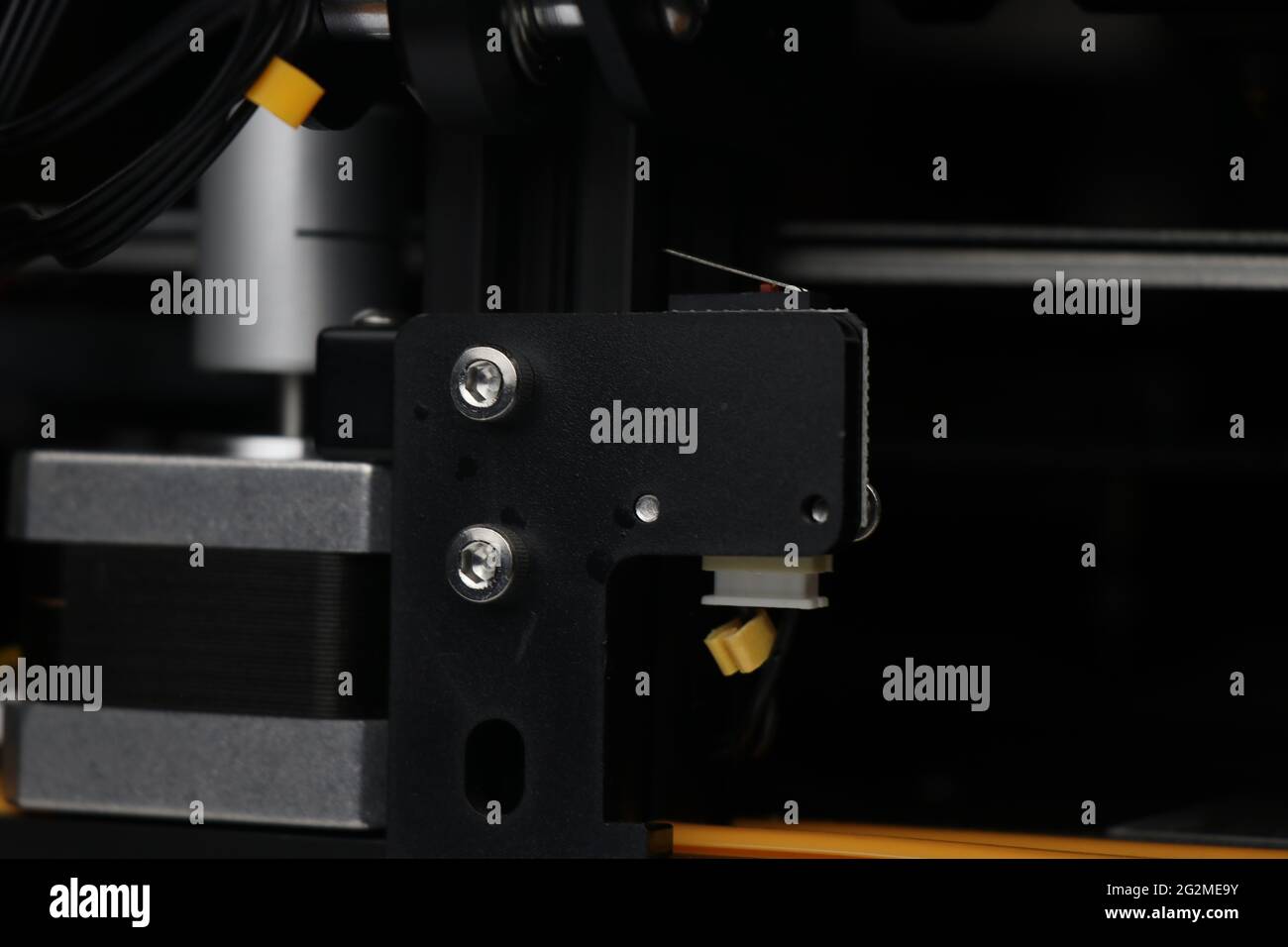 3D printer parts closeup of limit switch and Stepper motor responsible