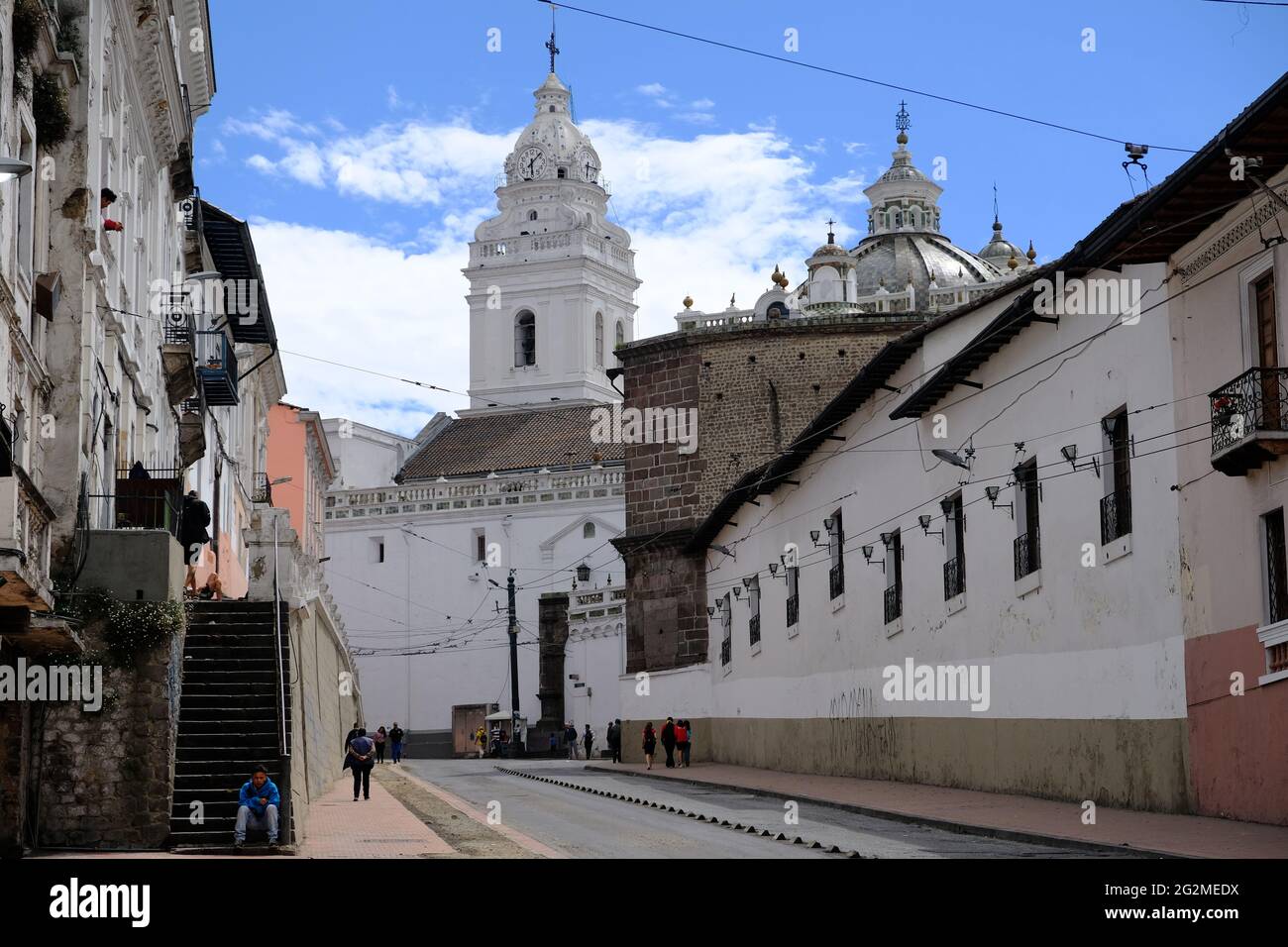 Ecuador Quito - Historical Center street photo with white colonial houses Stock Photo