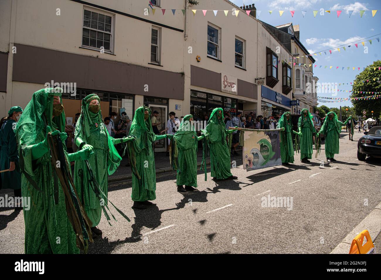 Falmouth Cornwall, Extinction Rebellion Protesters,green earth, from around the country march through the streets of Falmouth For the G 7 summit St Ives Cornwall Credit: kathleen white/Alamy Live News Stock Photo