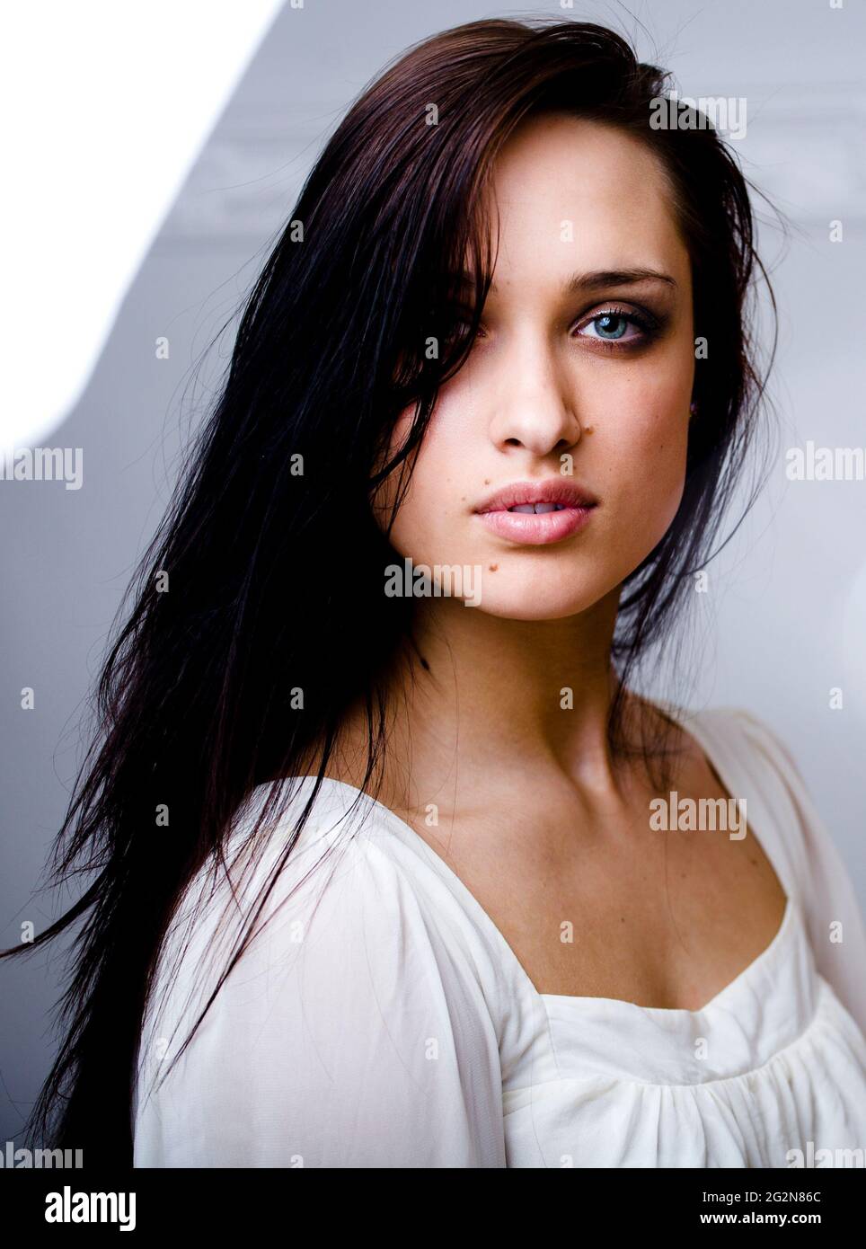 young pretty brunette woman smiling happy on white background smooth ...