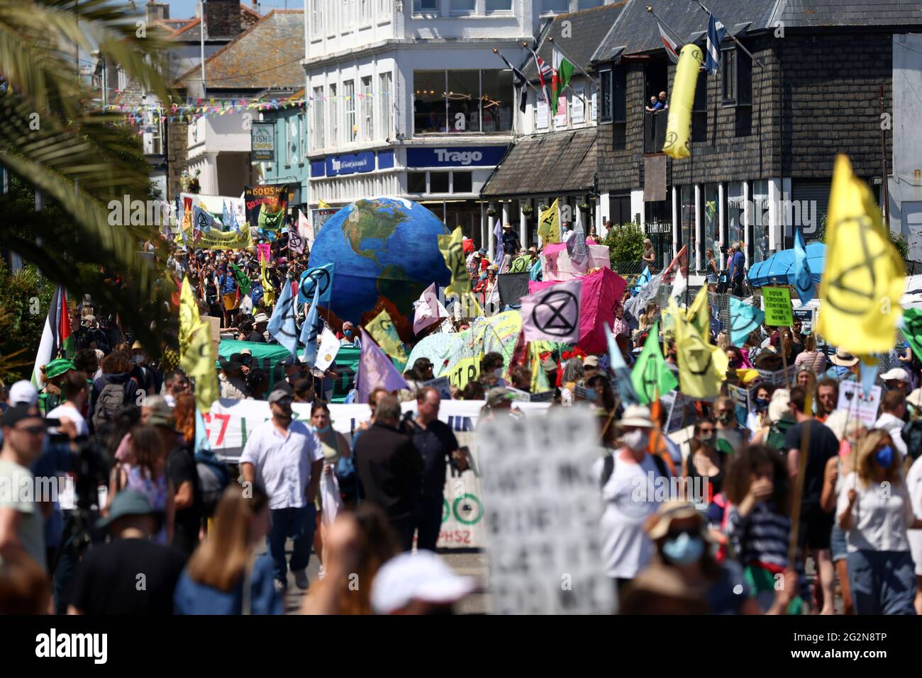 Protestors attend an Extinction Rebellion demonstration in Falmouth, during the G7 summit in Cornwall, Britain, June 12, 2021. REUTERS/Tom Nicholson Stock Photo