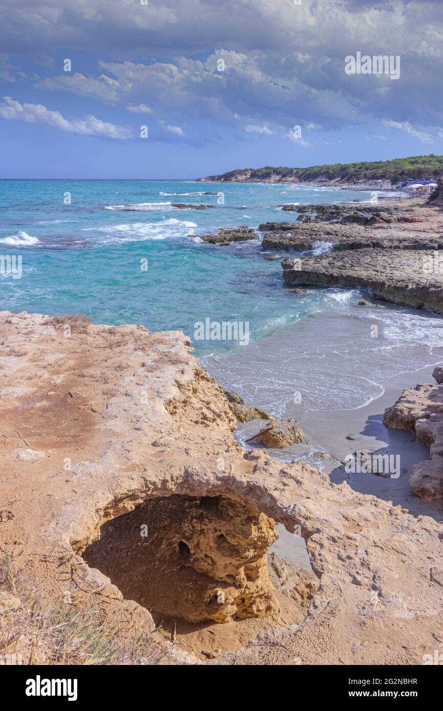 Typical coastline of Salento: view of Conca Specchiulla beach ( Apulia, Italy): it's characterized by small sandy coves and  dunes and rocky coast. Stock Photo