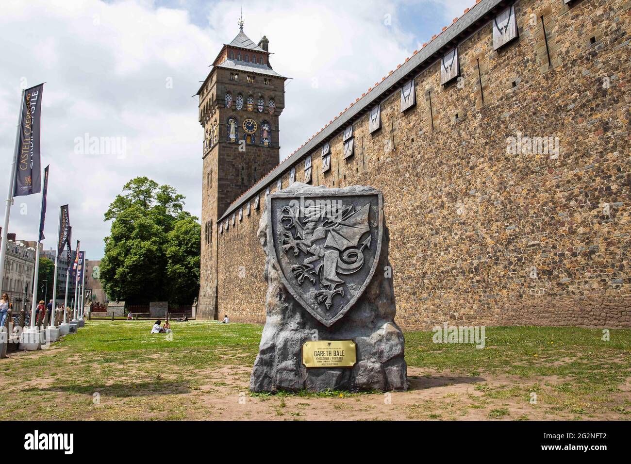 A Welsh dragon football crest outside Cardiff Castle during Euro 2020, June 2021. Stock Photo