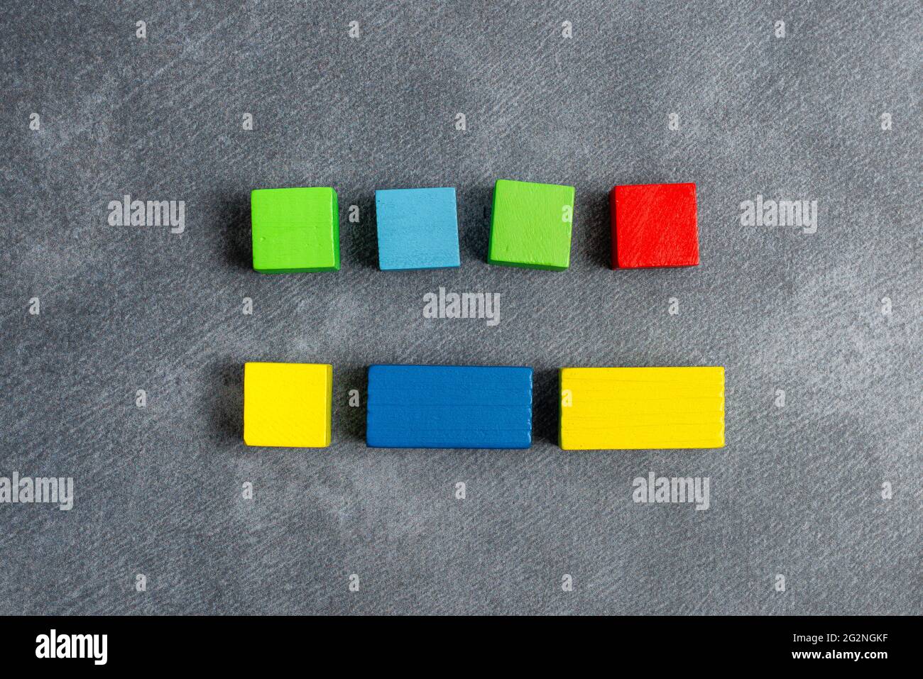Stack of Sample Cube Rectangular Boxes On Surface Polished With Multi-Colour Stock Photo