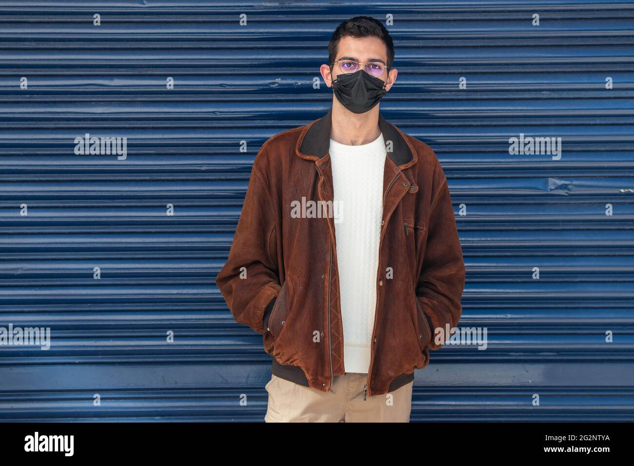 Portrait of young man in respiratory mask with hi-res stock photography ...