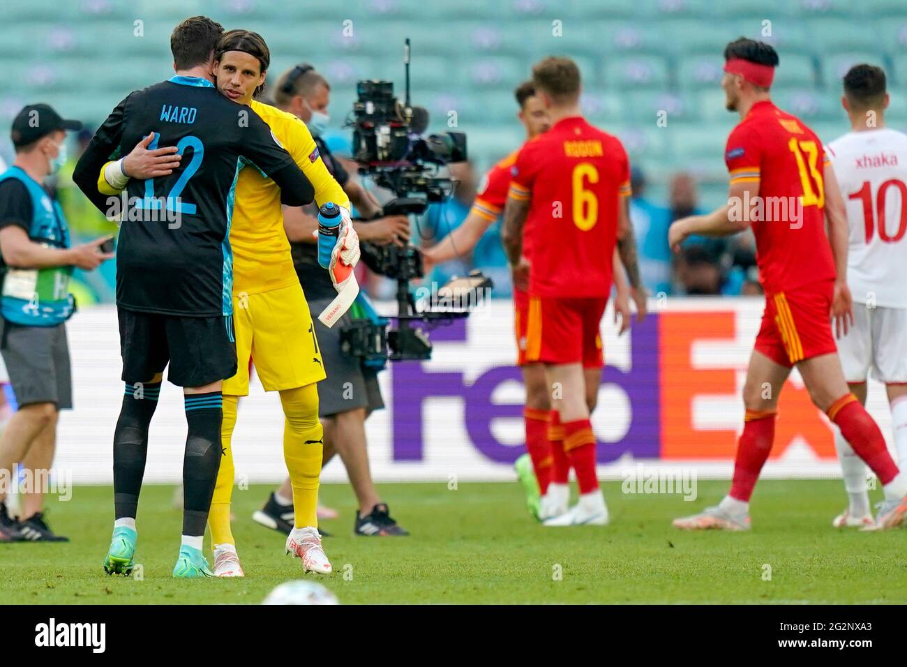 Wales goalkeeper Danny Ward and Switzerland goalkeeper Yann Sommer embrace after the UEFA Euro 2020 Group A match at the Baku Olympic Stadium, Azerbaijan. Picture date: Saturday June 12, 2021. Stock Photo
