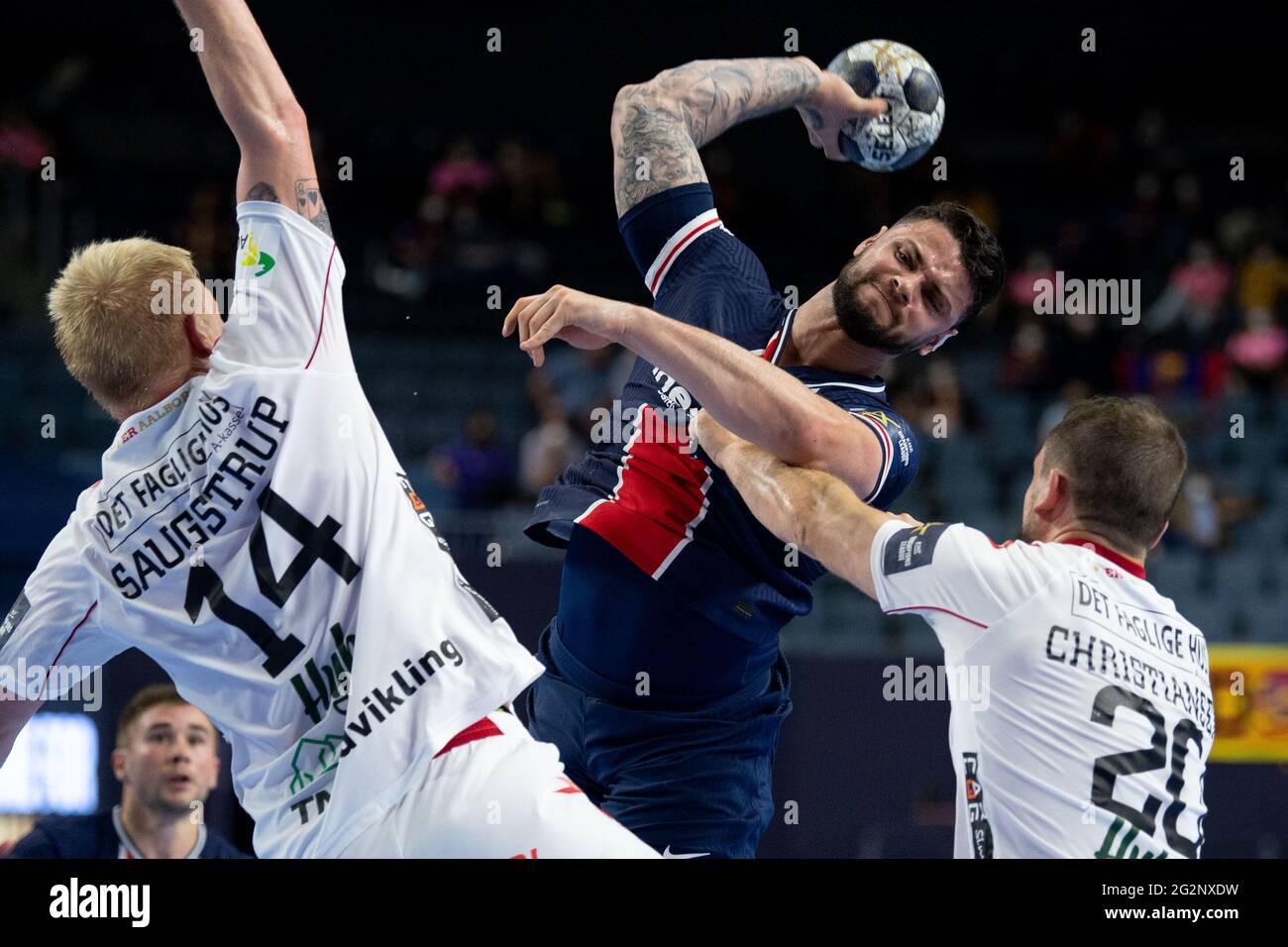 Cologne, Germany. 12th June, 2021. Handball: Champions League, Paris St.  Germain - Aalborg HB, final round, Final Four, semi-final at Lanxess Arena.  Magnus Saugstrup Jensen (l) and Mads Christiansen (r) of Aalborg