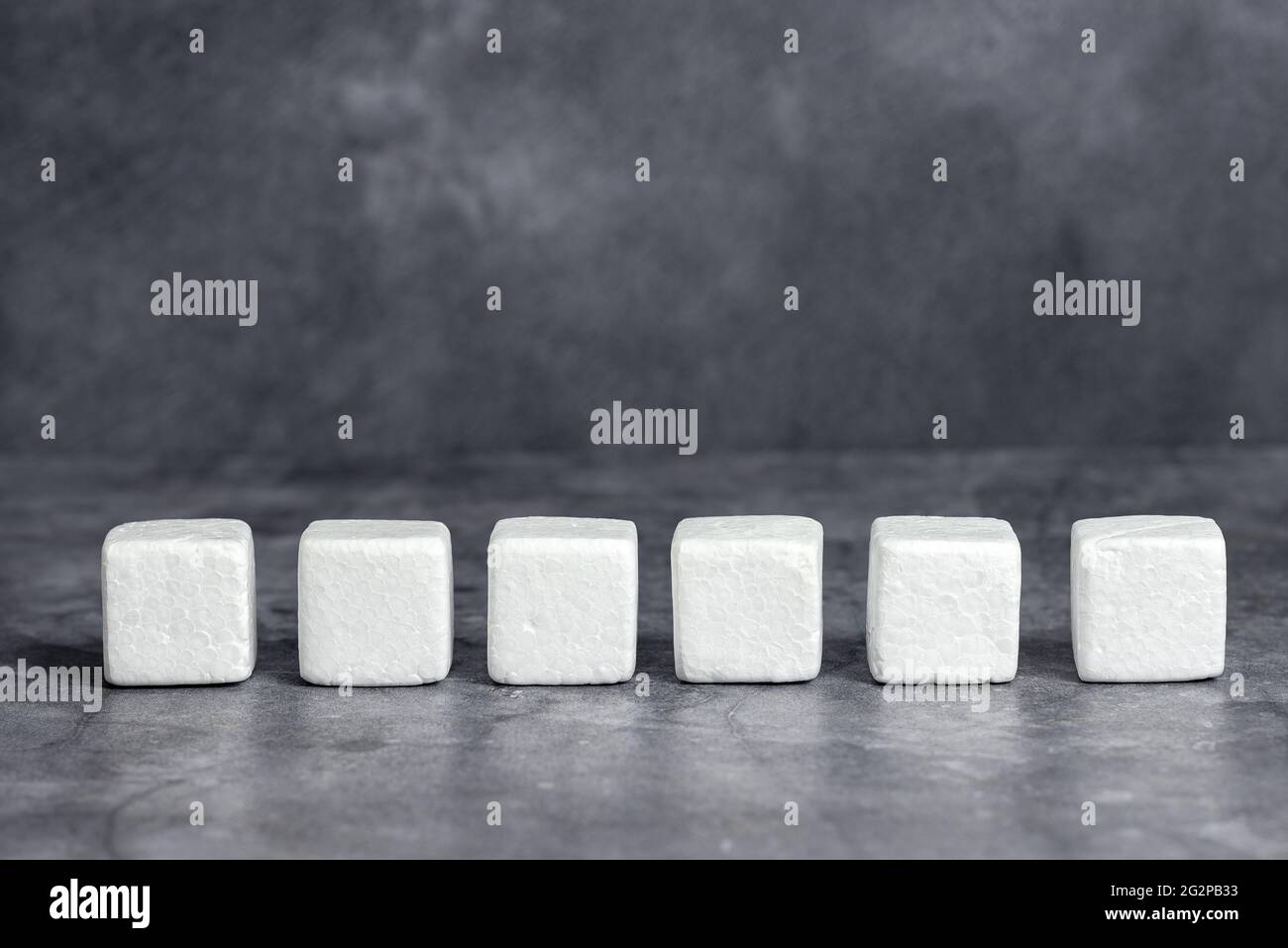 Stack of Sample Cube Rectangular Boxes On Surface Polished With Multi-Colour Stock Photo