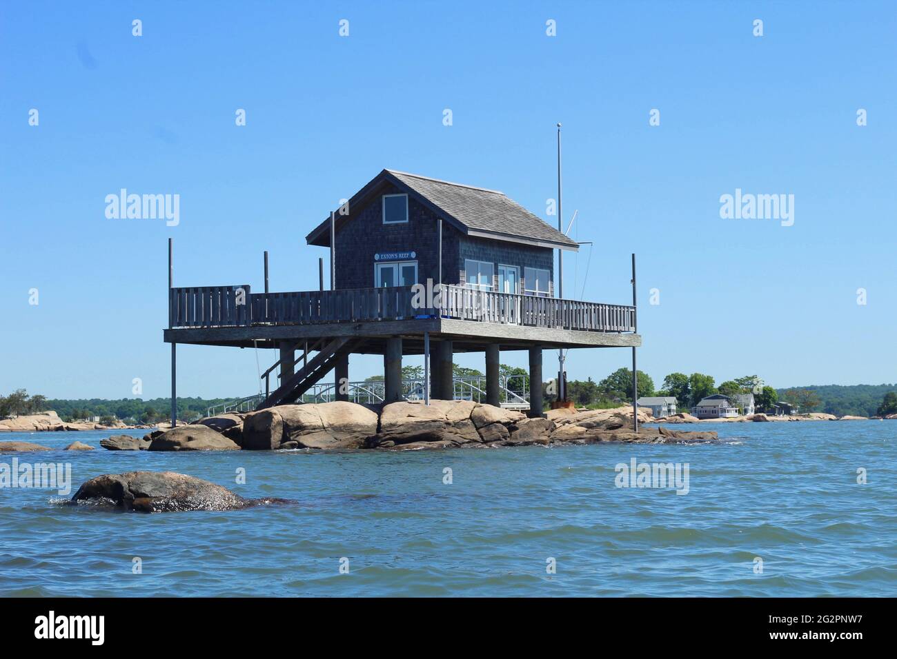 Kayaking around Exton's Reef Island house in the Thimble Islands of