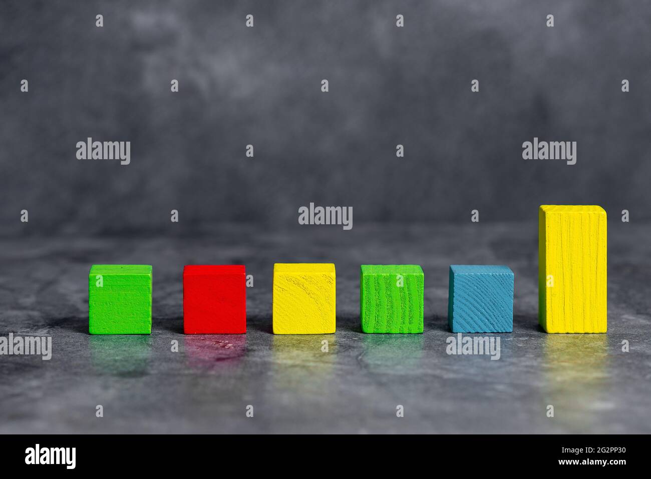 Stack of Sample Cube Rectangular Boxes On Surface Polished With Multi-Colour Stock Photo