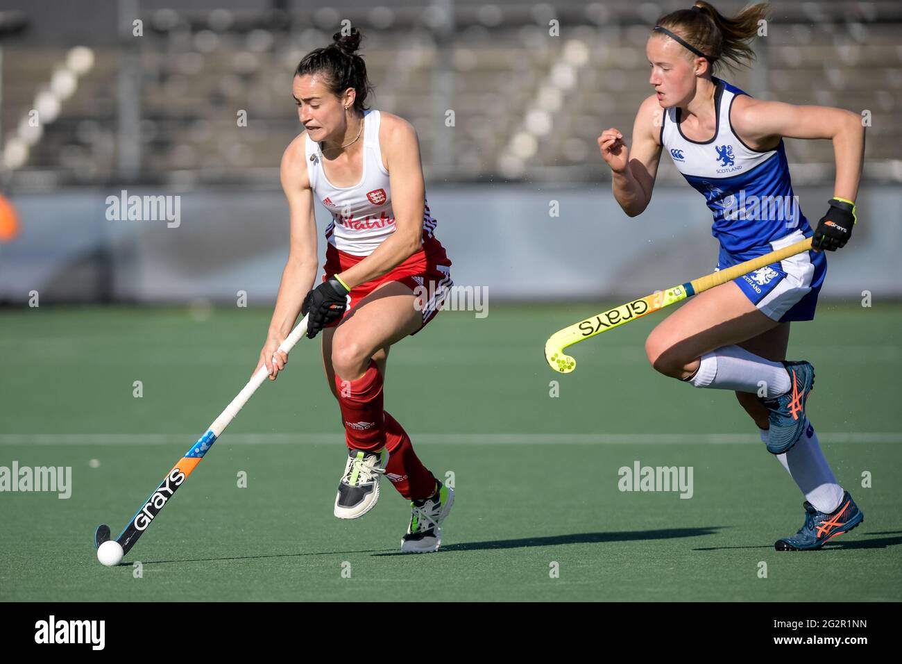 AMSTELVEEN, NETHERLANDS - JUNE 12: Fiona Crackles of England and Elizabeth  Wilson of Scotland during the Euro Hockey Championships match between  England and Scotland at Wagener Stadion on June 12, 2021 in