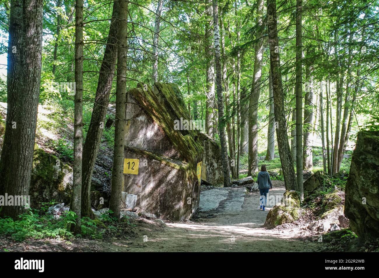Gierloz, Poland. 2nd June, 2021. People visiting the WWII era Adolf Hitler's quarters hidden in a forest near Gierloz, Poland, are seen on 3 June 2021 r Wolf's Lair (ger. Wolfsschanze) ruins of Adolf Hilter's war headquarters was a hidden town in the woods consisting of 200 buildings: shelters, barracks, 2 airports, a power station, a railway station, air-conditioners, water supplies, heat-generating plants and two teleprinters (Photo by Vadim Pacajev/Sipa USA) Credit: Sipa USA/Alamy Live News Stock Photo