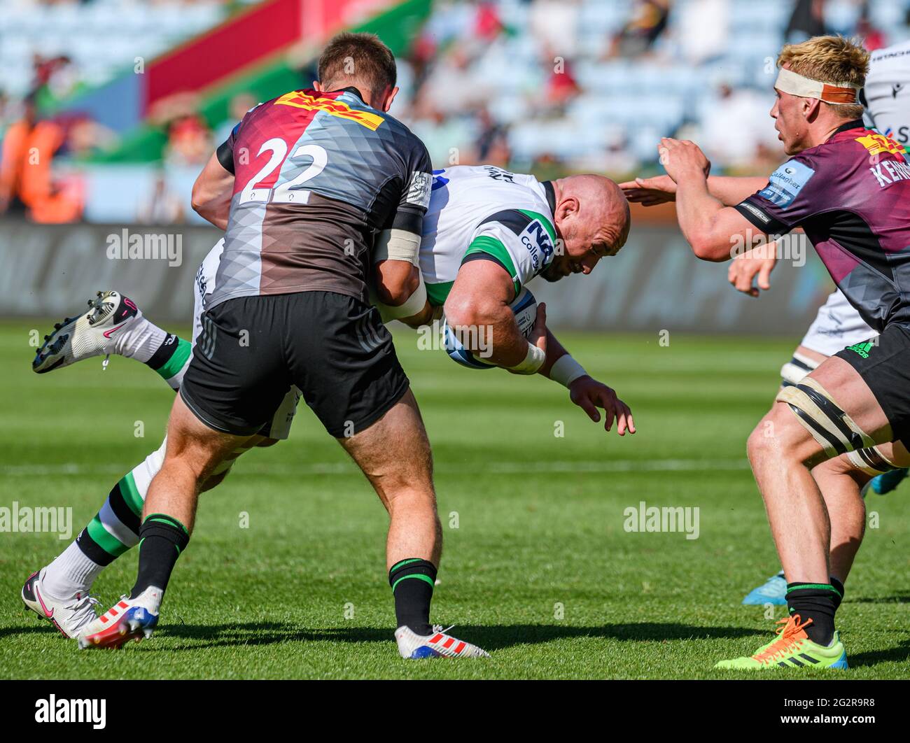 LONDON, UNITED KINGDOM. 12th, Jun 2021. Carl Perrns of Newcastle Falcons (centre) is tackled during Gallagher Premiership Rugby Match between Harlequins vs Newcastle Falcons at Twickenham Stoop Stadium on Saturday, 12 June 2021. LONDON ENGLAND.  Credit: Taka G Wu/Alamy Live News Stock Photo