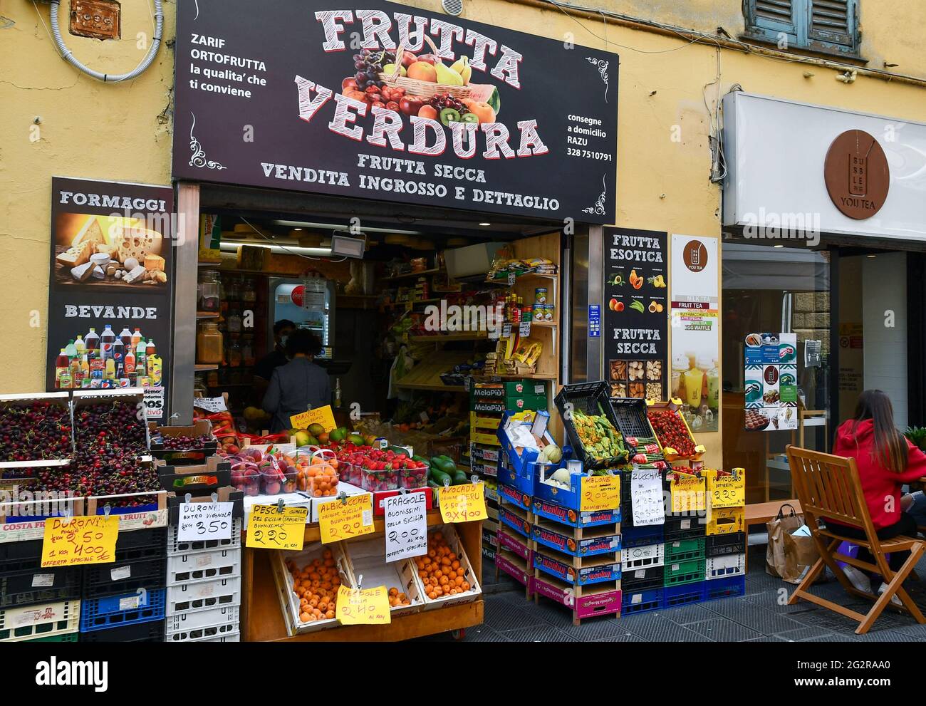 Exterior of a grocery store with fresh fruits and vegetables displayed