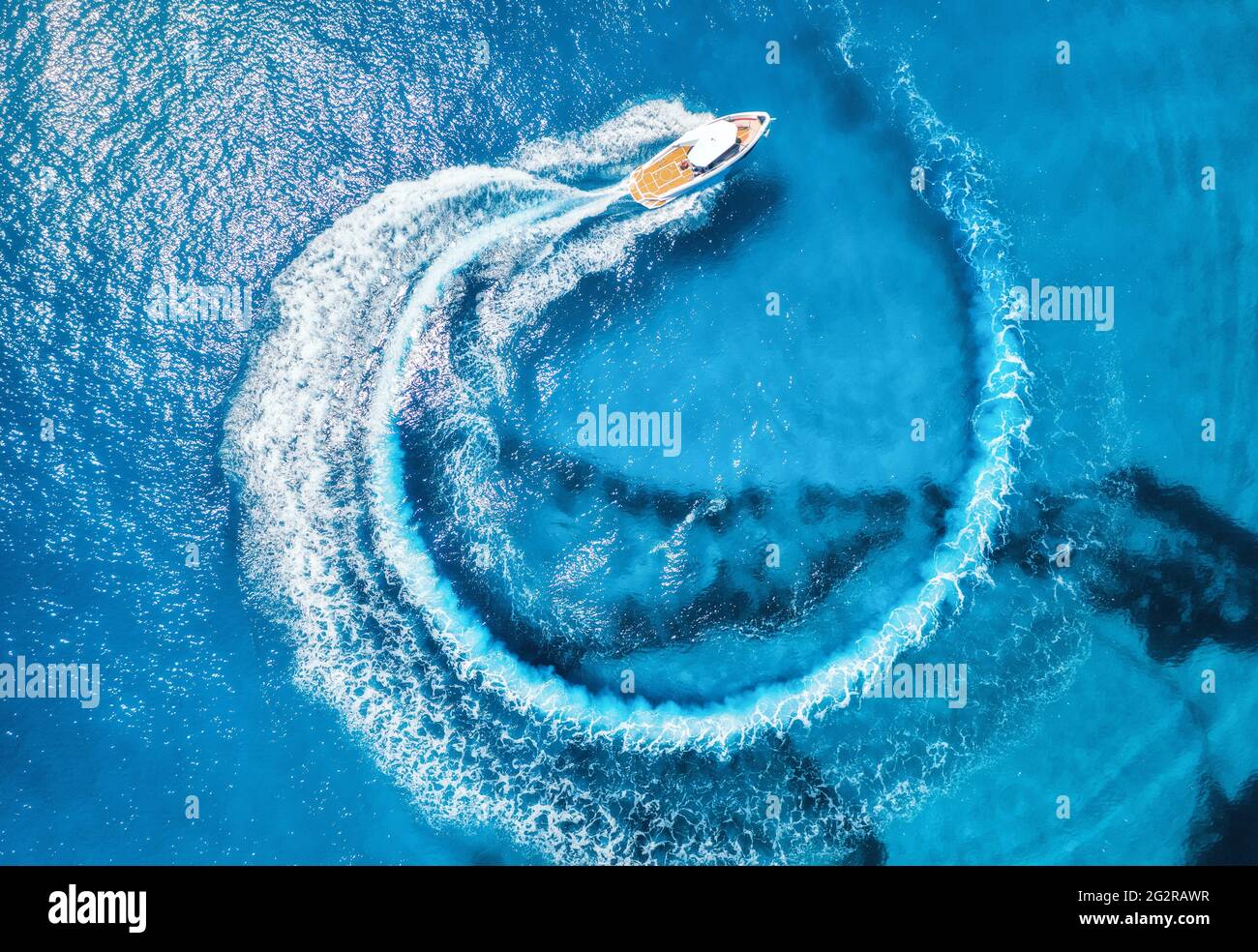 Aerial view of the speed boat in clear blue water at sunny day Stock ...