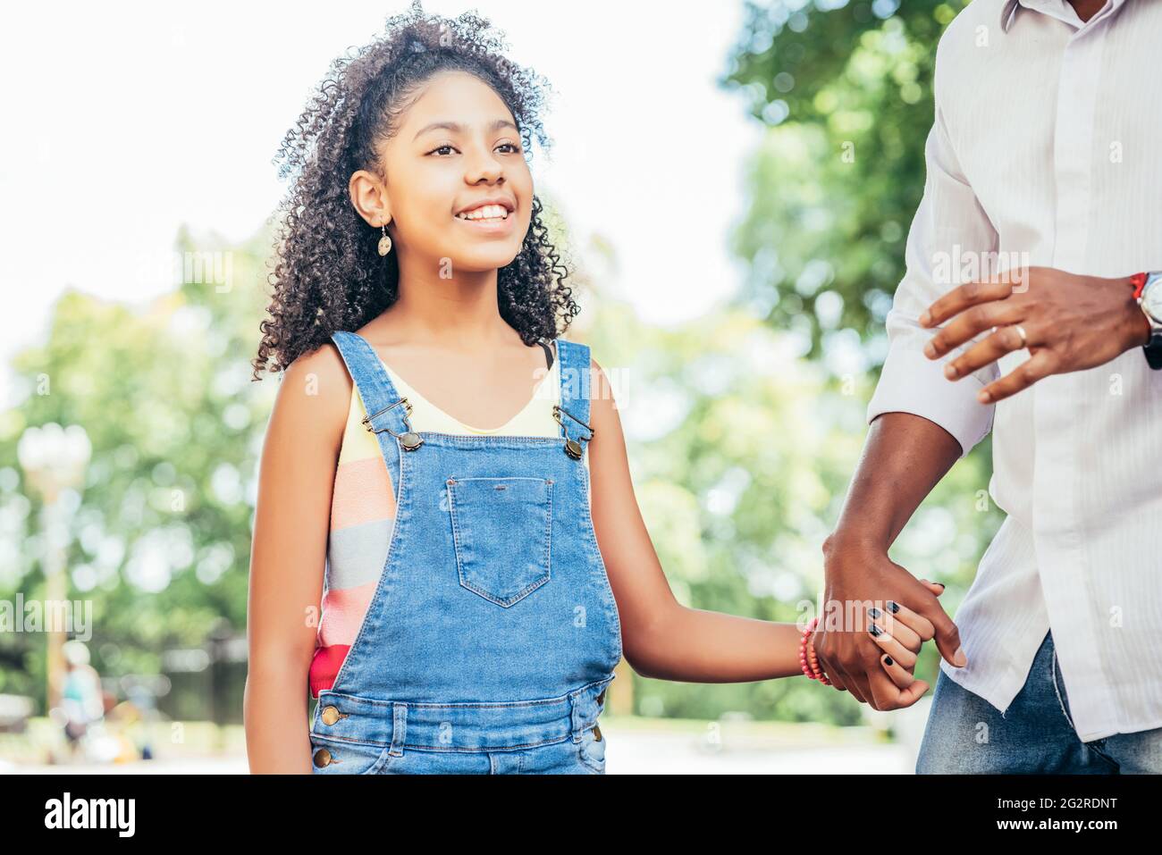 Father and daughter enjoying a walk together outdoors Stock Photo - Alamy