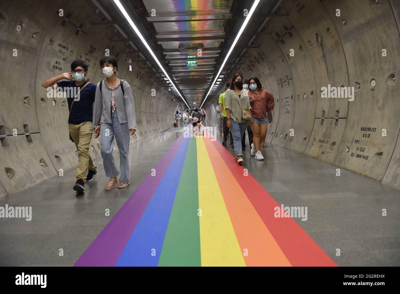 Bangkok, Thailand. 12th June, 2021. The famous shopping mall in the heart of Bangkok Samyan Mitrtown organizes the Samyan Mitr Proud 100% Love campaign by renovating the tunnel corridors. and pedestrian with decorations with colors To celebrate LGBTQ's Pride Month, or Pride Month, it caught the attention of passersby who had to take a photo. (Photo by Teera Noisakran/Pacific Press) Credit: Pacific Press Media Production Corp./Alamy Live News Stock Photo