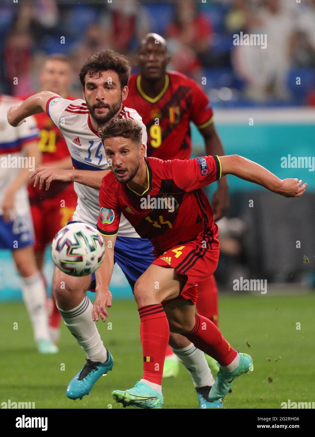 12 June 2021, Russia, St. Petersburg: Football: European Championship, Belgium - Russia, preliminary round, Group B, matchday 1 at St. Petersburg Stadium. Georgi Dzhikia (Russia) and Dries Mertens (Belgium, r) in action. Important: For editorial news reporting purposes only. Not used for commercial or marketing purposes without prior written approval of UEFA. Images must appear as still images and must not emulate match action video footage. Photographs published in online publications (whether via the Internet or otherwise) shall have an interval of at least 20 seconds between the posting. Ph Stock Photo