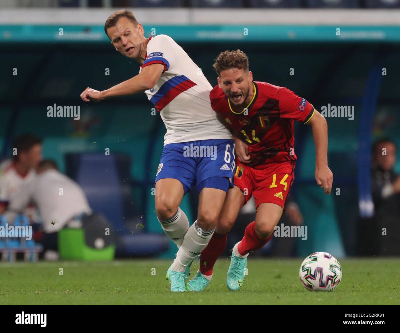 12 June 2021, Russia, St. Petersburg: Football: European Championship, Belgium - Russia, preliminary round, Group B, matchday 1 at St. Petersburg Stadium. Denis Cheryshev (Russia) and Dries Mertens (Belgium, r) in action. Important: For editorial news reporting purposes only. Not used for commercial or marketing purposes without prior written approval of UEFA. Images must appear as still images and must not emulate match action video footage. Photographs published in online publications (whether via the Internet or otherwise) shall have an interval of at least 20 seconds between the posting. P Stock Photo